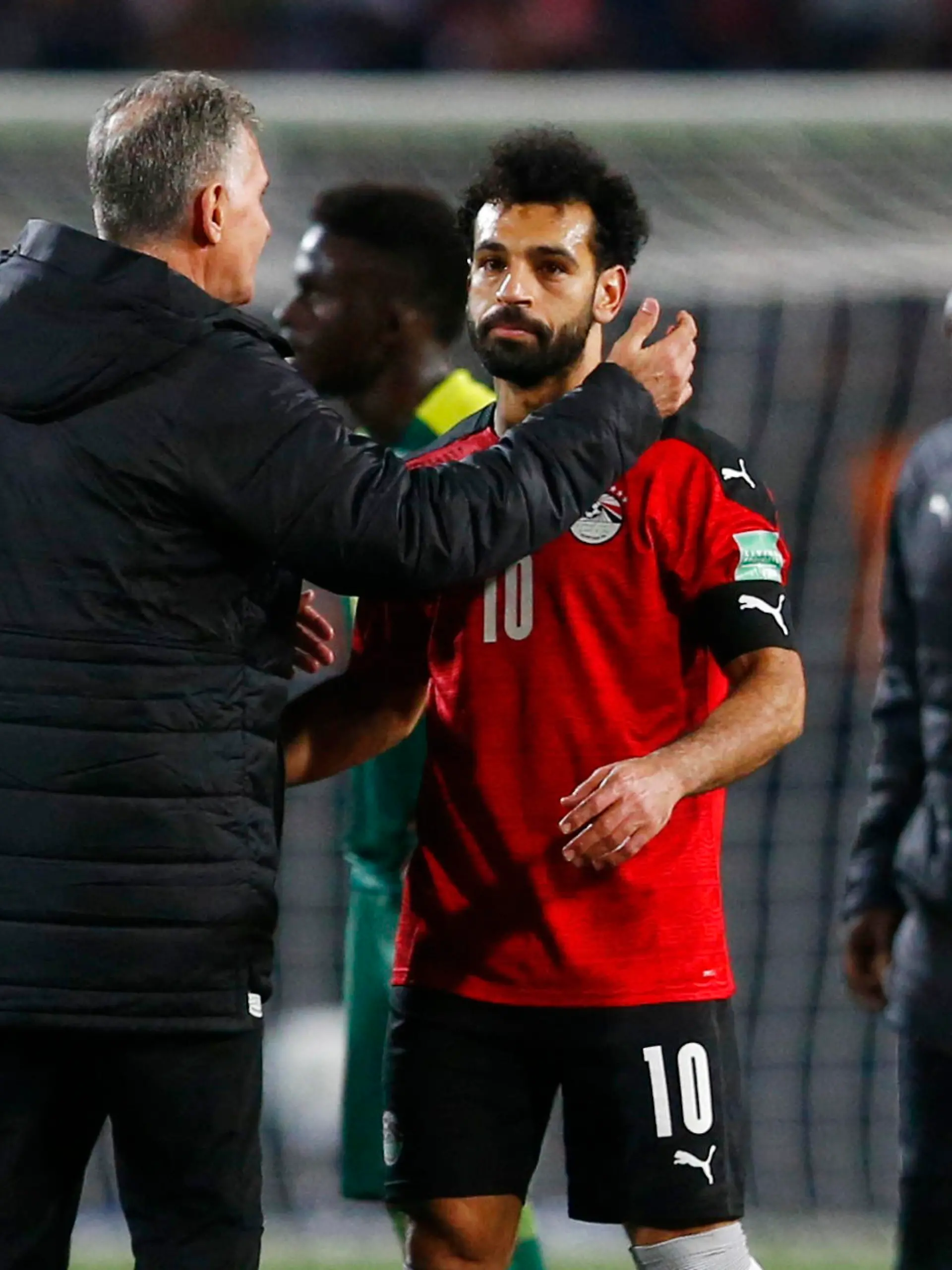 Soccer Football - World Cup - African Qualifiers - Egypt v Senegal - Cairo International Stadium, Cairo, Egypt - March 25, 2022 Egypt's Mohamed Salah celebrates with coach Carlos Queiroz after the match REUTERS/Amr Abdallah Dalsh