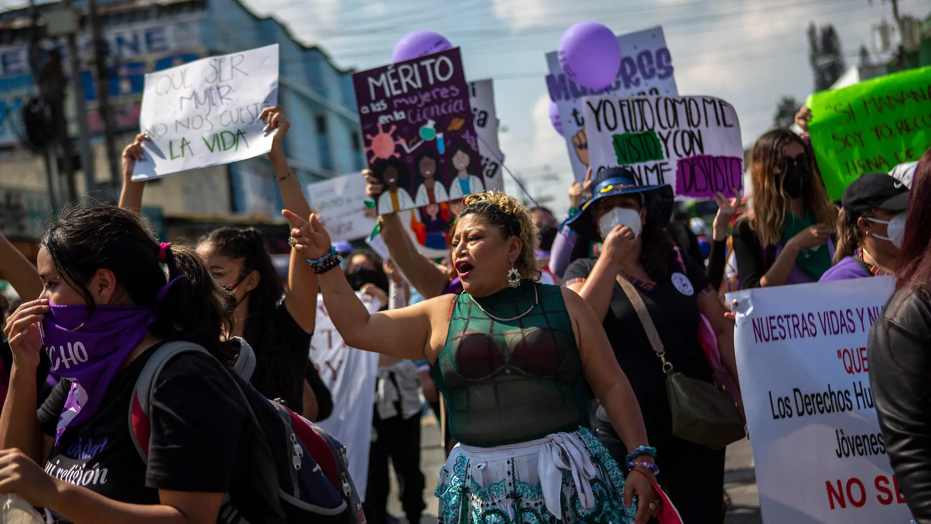 Women participate in a demonstration marking International Women's Day in downtown Guatemala City, Tuesday, March 8, 2022. (AP Photo/Oliver de Ros)
