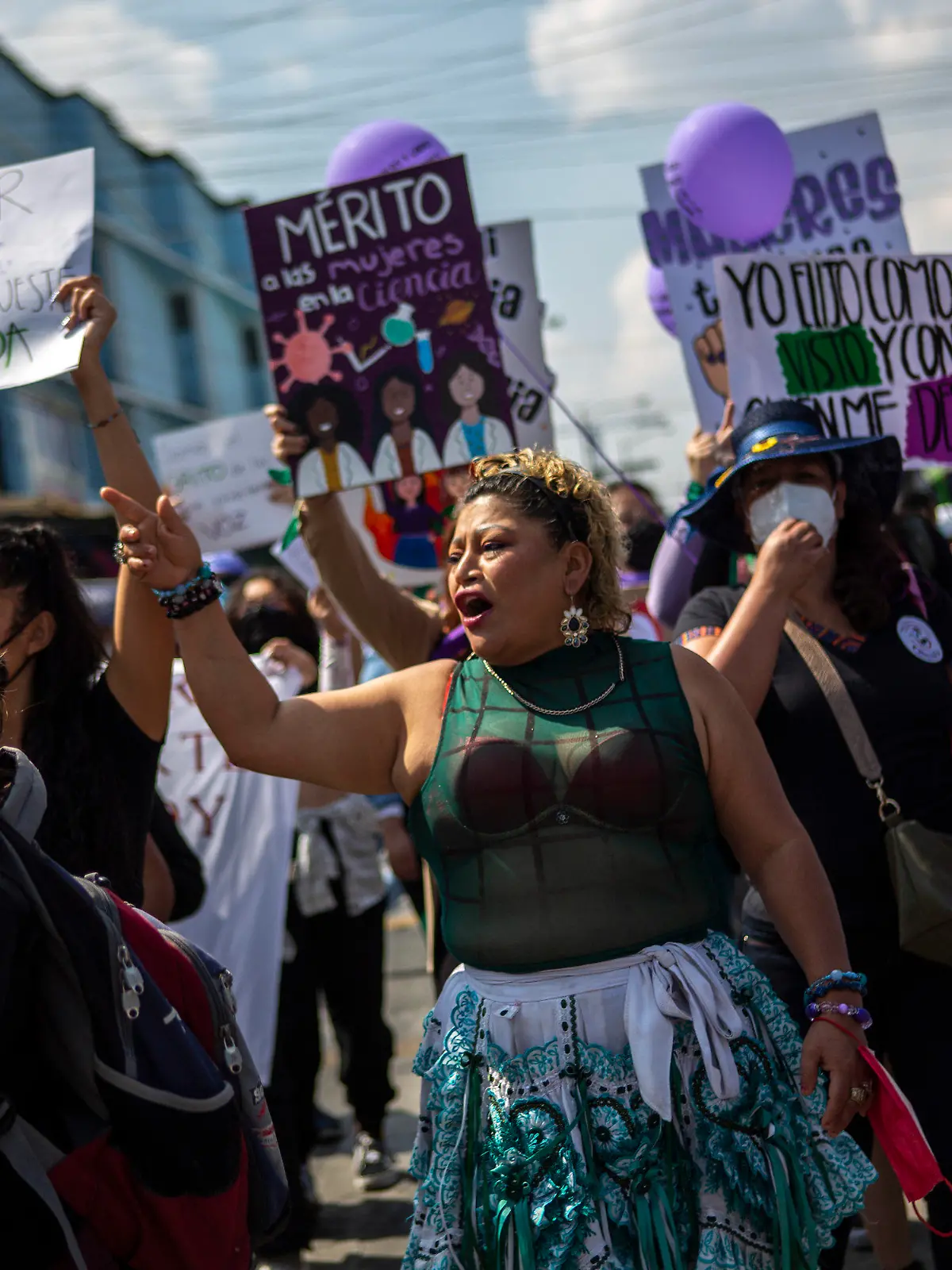 Women participate in a demonstration marking International Women's Day in downtown Guatemala City, Tuesday, March 8, 2022. (AP Photo/Oliver de Ros)