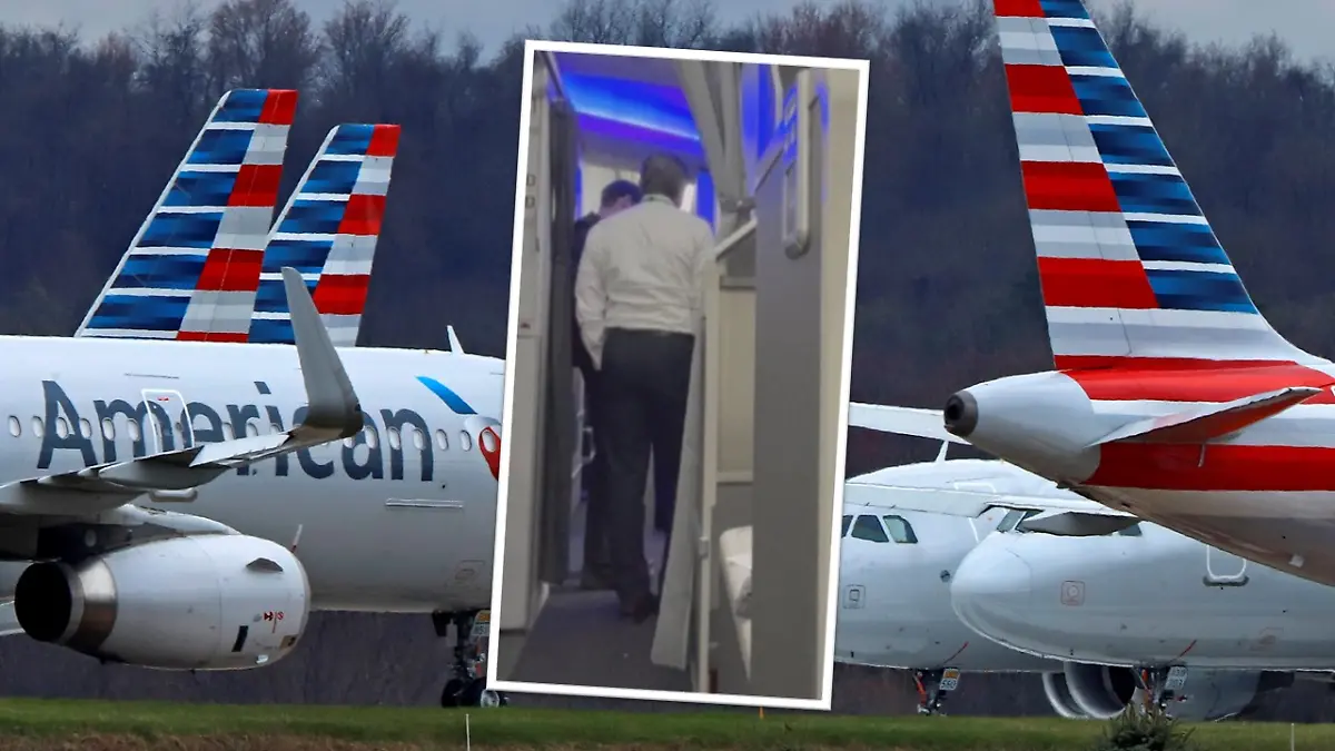 Der randalierende Passagier wird nach der Landung von Sicherheitsbeamten von Bord begleitet.