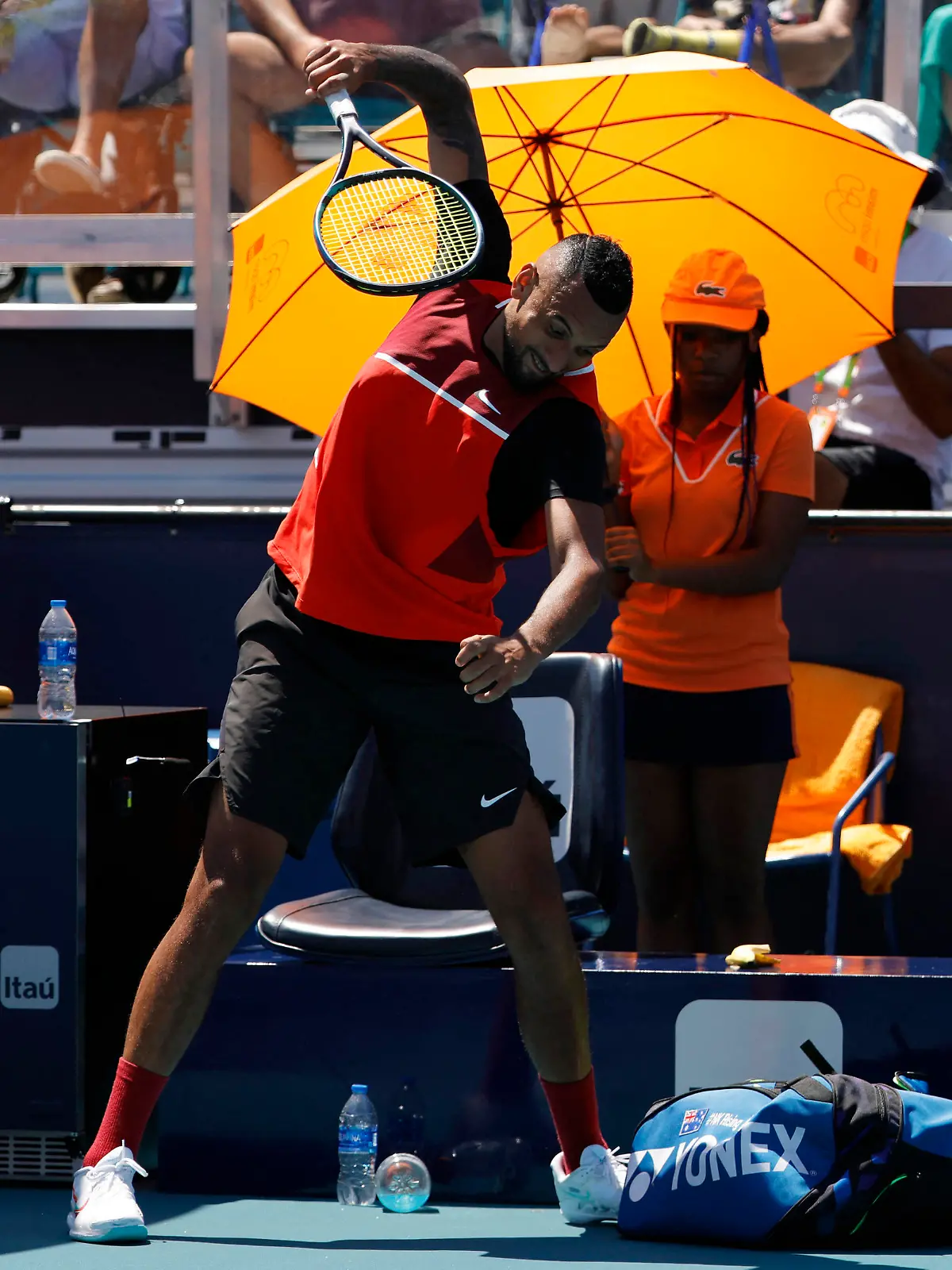 Mar 29, 2022; Miami Gardens, FL, USA; Nick Kyrgios (AUS) smashes his racquet at the end of the first set after being assessed a point penalty against Jannik Sinner (ITA)(not pictured) in a fourth round men's singles match in the Miami Open at Hard Rock Stadium. Mandatory Credit: Geoff Burke-USA TODAY Sports