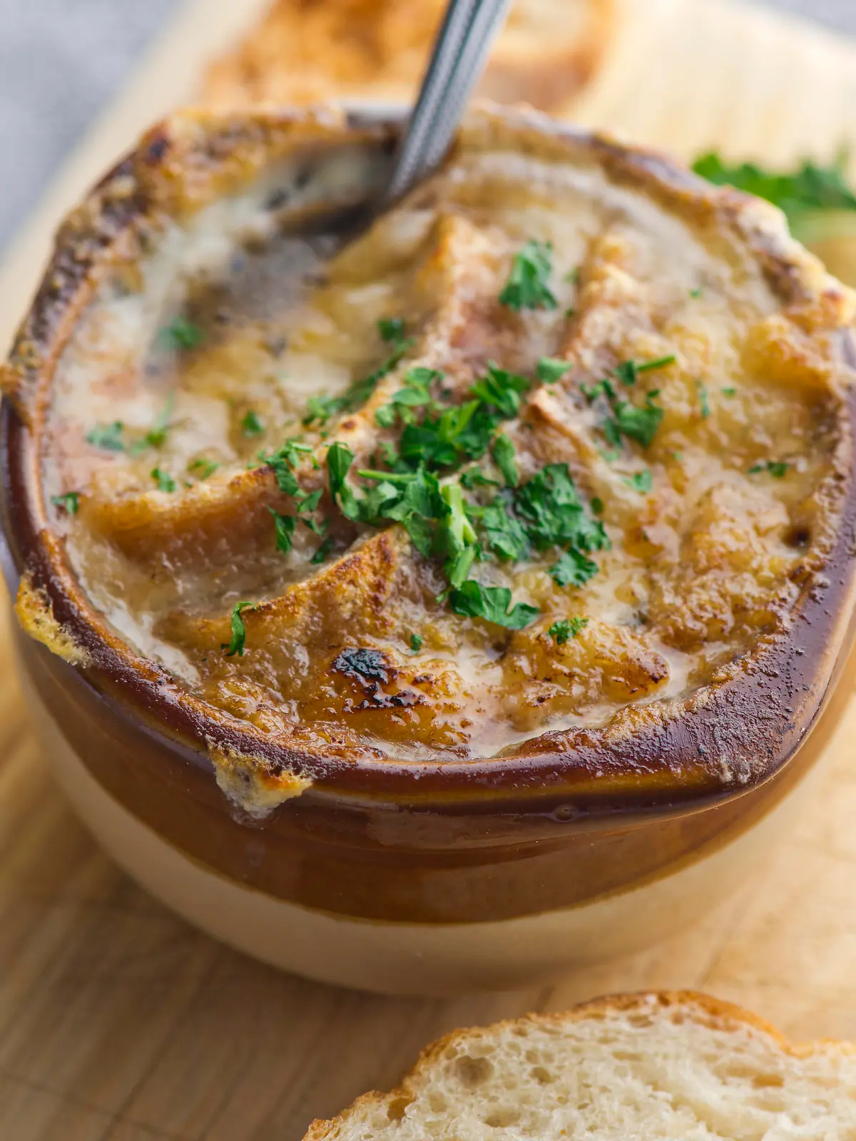 French onion Soup. Classic French or American restaurant or diner favorite. Beef broth, onions, Diced vegetables, celery, carrots, onions, garlic, sautéed in olive oil & slow cooked. Topped with melted cheese and served with toasted baguettes.
