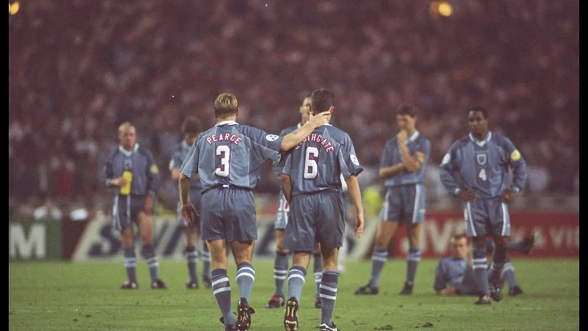 26 Jun 1996:  Stuart Pearce (left) consoles teammate Gareth Southgate after his penalty miss during the European soccer championships semi final match between England and Germany at Wembley Stadium, London. Germany won the match after extra time in a penalty shoot out by 1(6) 1(5). Mandatory Credit: Ross Kinnaird/Allsport UK