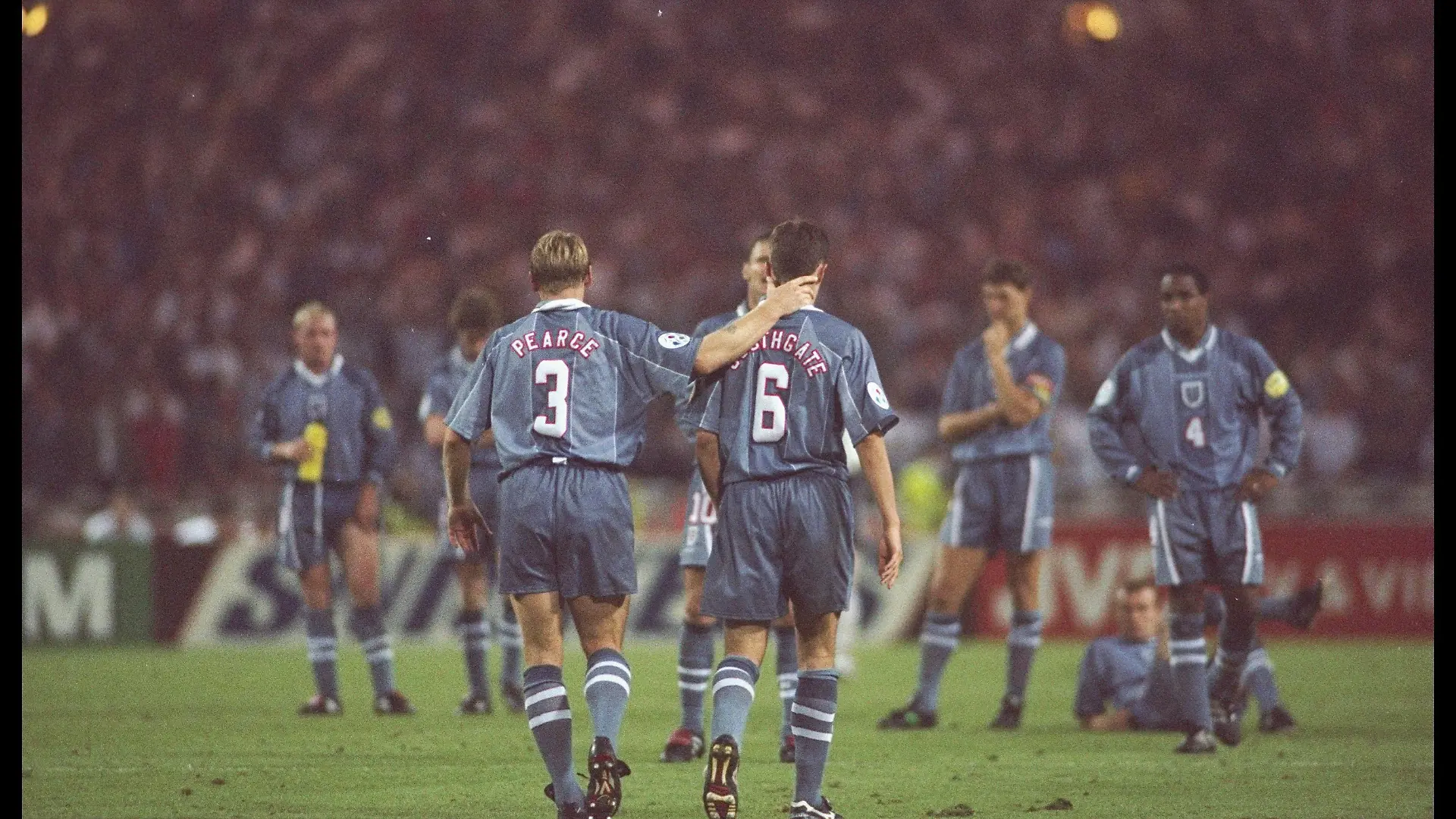 26 Jun 1996: Stuart Pearce (left) consoles teammate Gareth Southgate after his penalty miss during the European soccer championships semi final match between England and Germany at Wembley Stadium, London. Germany won the match after extra time in a penalty shoot out by 1(6) 1(5). Mandatory Credit: Ross Kinnaird/Allsport UK