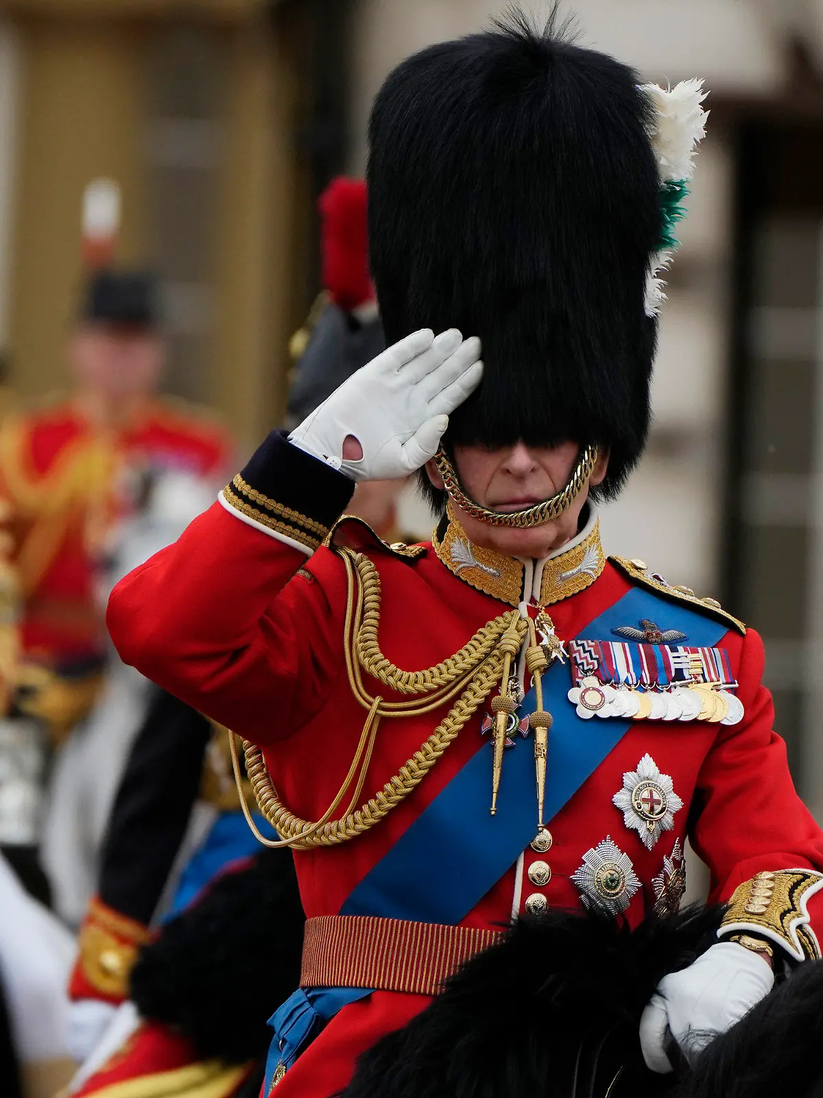 Britain's King Charles III leaves Buckingham Palace to take part in the Trooping The Colour parade, in London, Saturday, June 17, 2023. Trooping the Colour is the King's Birthday Parade and one of the nation's most impressive and iconic annual events attended by almost every member of the Royal Family.(AP Photo/Alastair Grant)