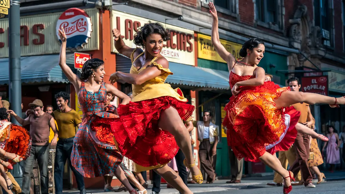 This image released by 20th Century Studios shows, from left, Ilda Mason as Luz, Ariana DeBose as Anita, and Ana Isabelle as Rosalia in "West Side Story." (Niko Tavernise/20th Century Studios via AP)