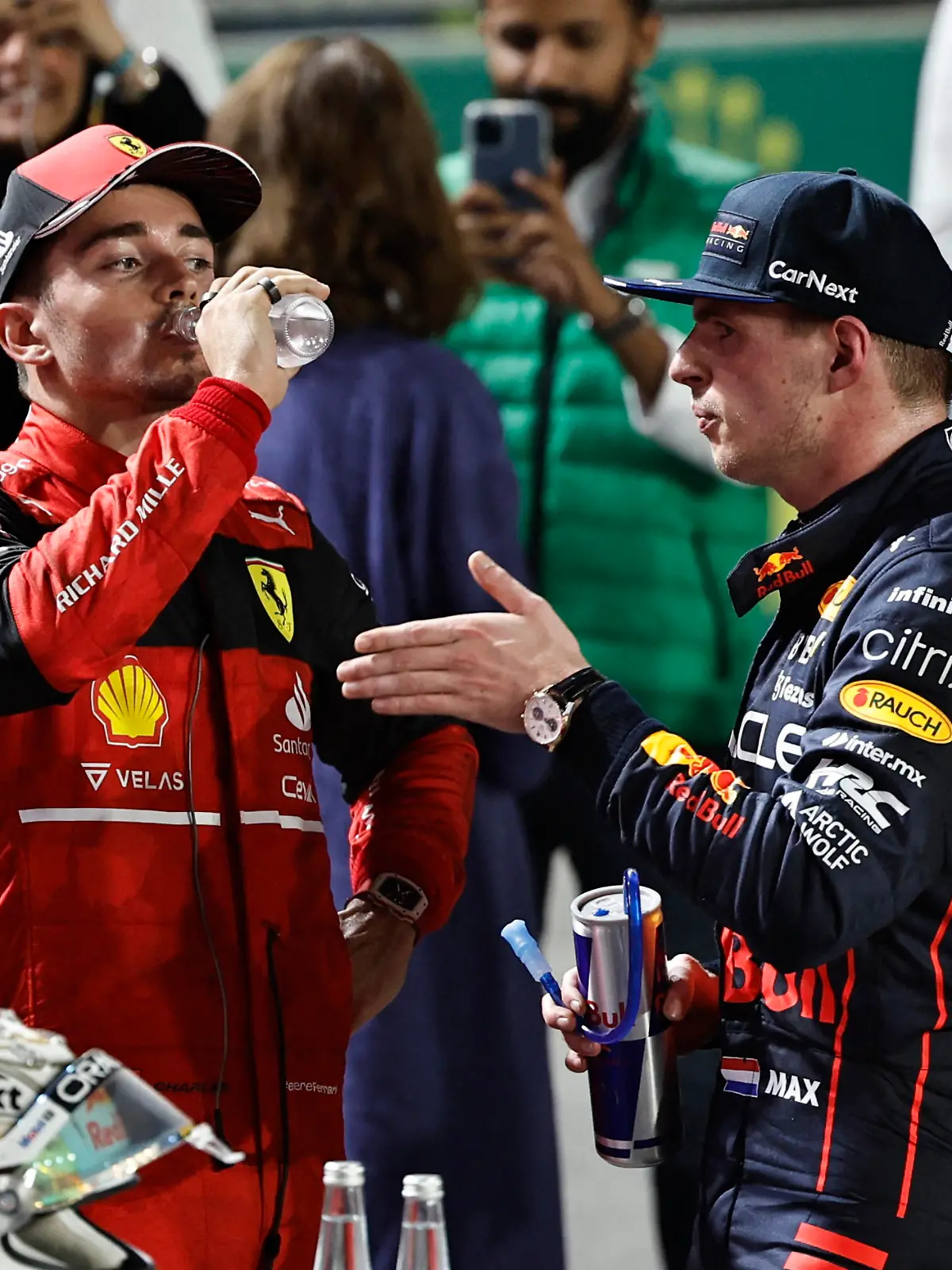 Formula One F1 - Saudi Arabia Grand Prix - Jeddah Corniche Circuit, Jeddah, Saudi Arabia - March 27, 2022 Red Bull's Max Verstappen celebrates winning the race with second placed Ferrari's Charles Leclerc REUTERS/Hamad I Mohammed