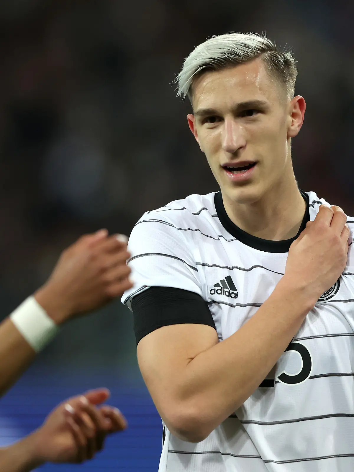 SINSHEIM, GERMANY - MARCH 26: Nico Schlotterbeck of Germany looks on during the International Friendly match between Germany and Israel at PreZero-Arena on March 26, 2022 in Sinsheim, Germany.  (Photo by Alexander Hassenstein/Getty Images)