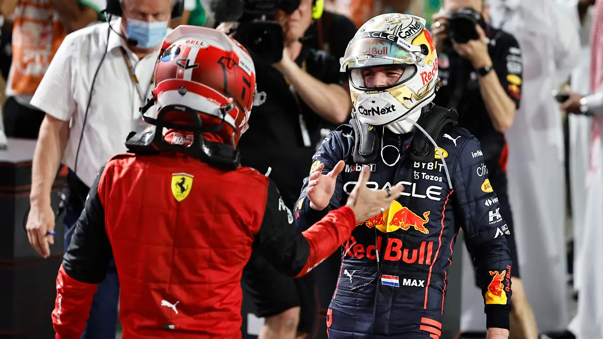 Formula One F1 - Saudi Arabia Grand Prix - Jeddah Corniche Circuit, Jeddah, Saudi Arabia - March 27, 2022 Red Bull's Max Verstappen celebrates winning the race with second placed Ferrari's Charles Leclerc REUTERS/Hamad I Mohammed