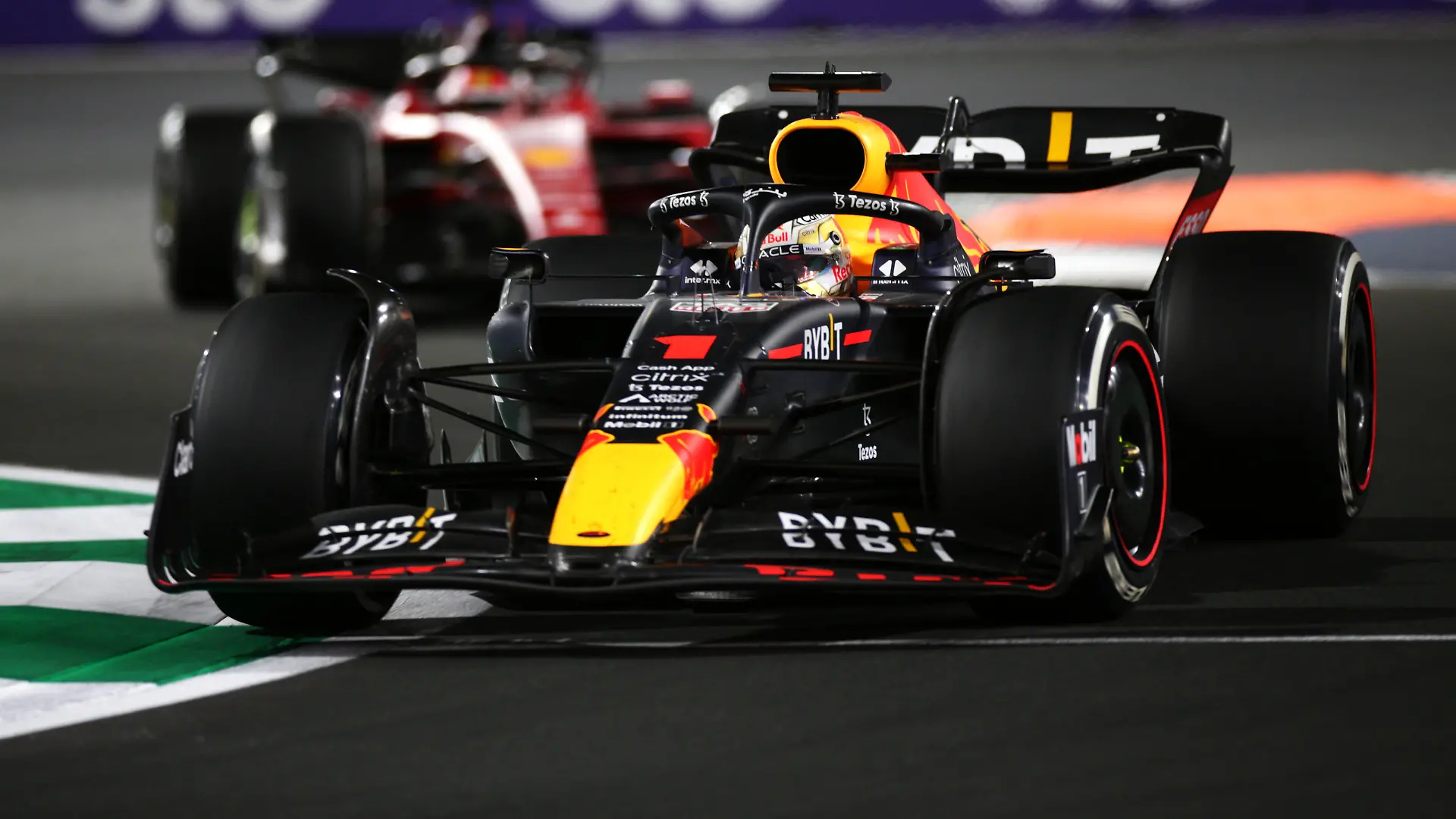 JEDDAH, SAUDI ARABIA - MARCH 27: Max Verstappen of the Netherlands driving the (1) Oracle Red Bull Racing RB18 leads Charles Leclerc of Monaco driving (16) the Ferrari F1-75 during the F1 Grand Prix of Saudi Arabia at the Jeddah Corniche Circuit on March 27, 2022 in Jeddah, Saudi Arabia. (Photo by Peter Fox/Getty Images)