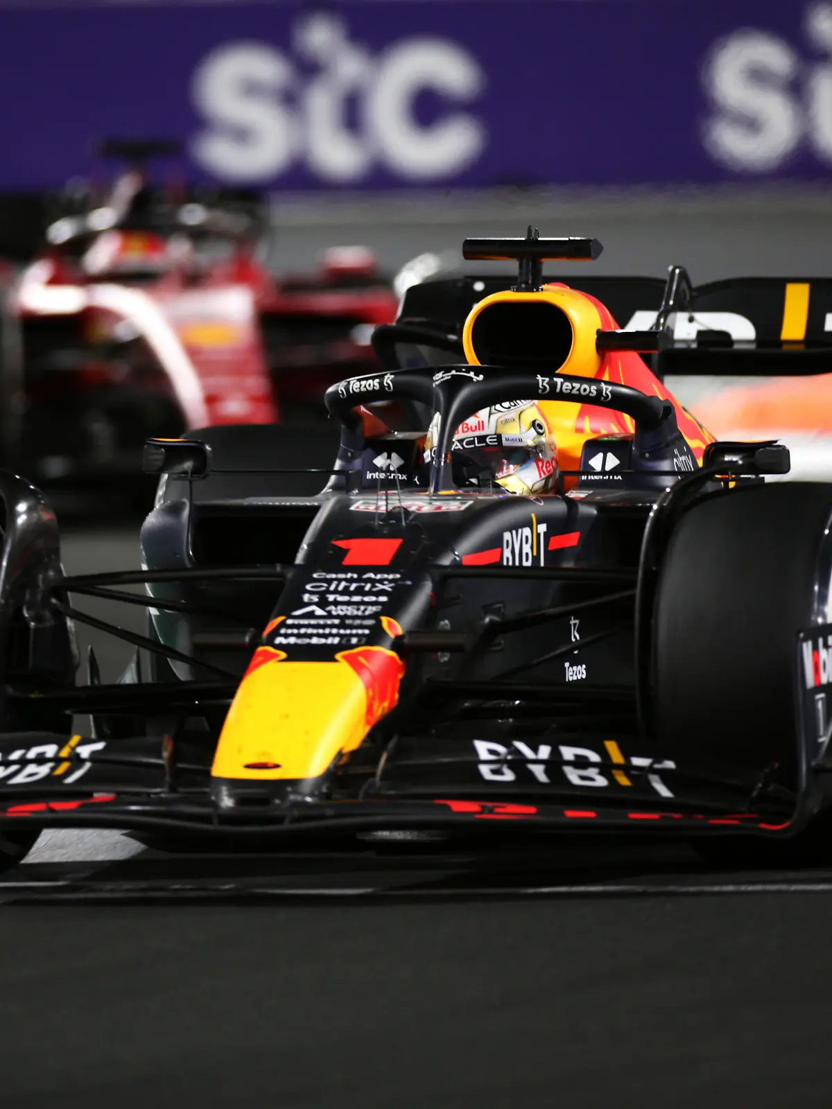 JEDDAH, SAUDI ARABIA - MARCH 27: Max Verstappen of the Netherlands driving the (1) Oracle Red Bull Racing RB18 leads Charles Leclerc of Monaco driving (16) the Ferrari F1-75 during the F1 Grand Prix of Saudi Arabia at the Jeddah Corniche Circuit on March 27, 2022 in Jeddah, Saudi Arabia. (Photo by Peter Fox/Getty Images)