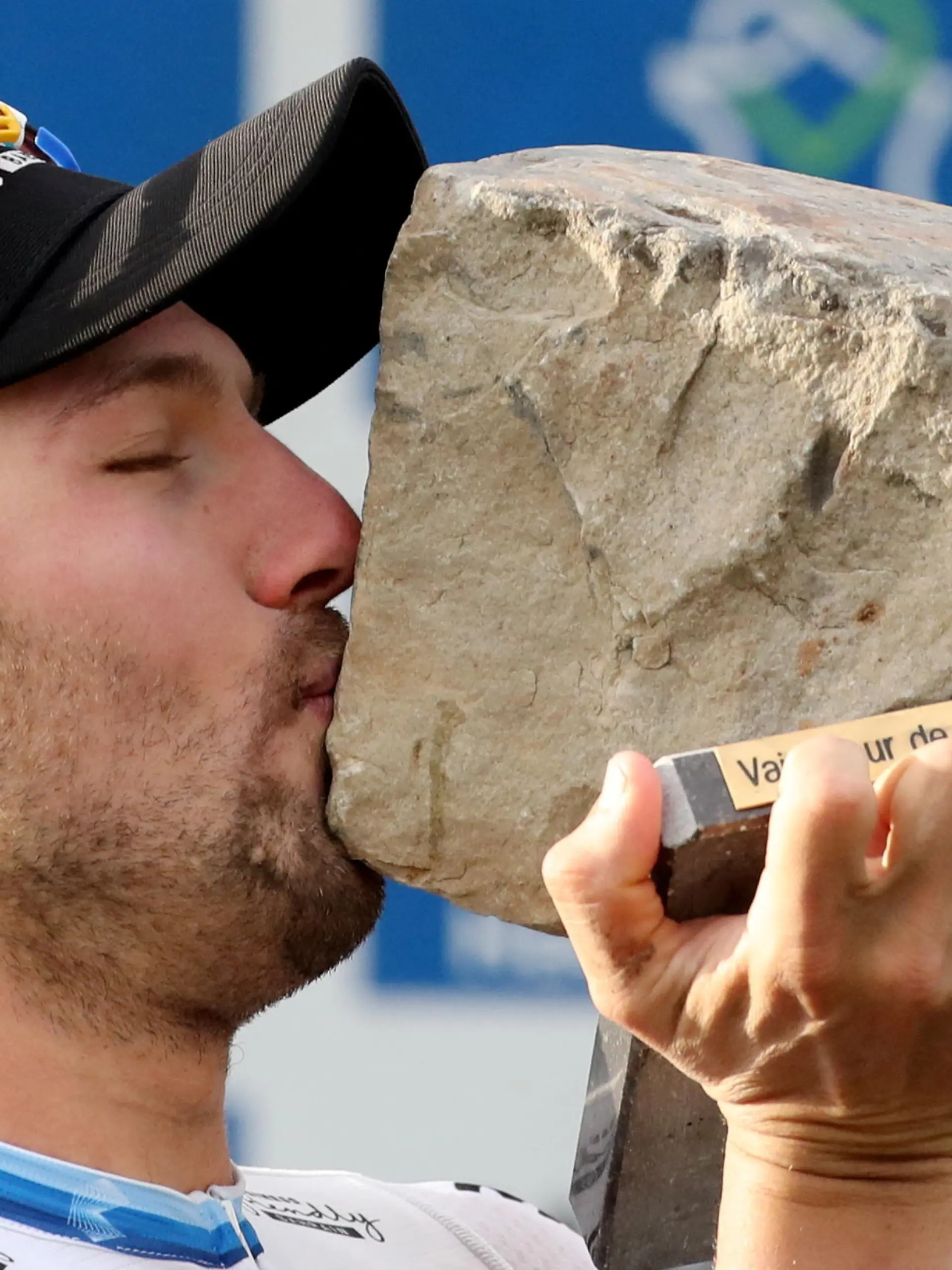 FILE PHOTO: Cycling - Paris-Roubaix - Roubaix, France October 3, 2021  Italy's Sonny Colbrelli celebrates on the podium after winning the race REUTERS/Yves Herman/File Photo