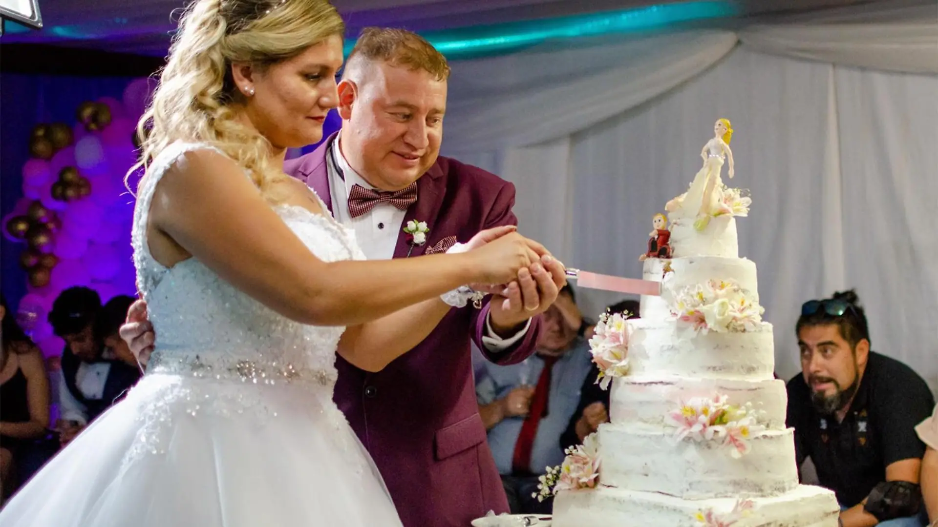 Story from Jam Press (Marijuana Wedding Cake)

Pictured: Alvaro Rodriguez's sister and husband cutting the marijuana cake at their wedding.

Man goes viral after baking sister ‘magical’ wedding cake laced with marijuana – leaving guests high as kites

A man has gone viral on TikTok after baking a wedding cake for his sister laced with marijuana – leaving guests high as kites.

Alvaro Rodriguez, 29, from Santiago, Chile, laced one of the seven tiers with cannabis – which is legal for private-at-home consumption – at his sister's big day last month. 

He spent 20 hours making and decorating the showpiece before dropping it off at the party venue. 

The video, which has racked up over 13 million views on TikTok, shows the bride and groom cutting into the traditional-looking cake to cheers from 100 guests. 

Footage then cuts to 20 of the 100 wedding guests dancing merrily and laughing as the effects kick in. 

The bride requested the fun cake after having a pleasant experience with “magical brownies”.

Alvaro uploaded a video showing the aftermath to TikTok, which racked up 13 million views and nearly two million likes, leaving viewers in stitches. 

One person said: "I'm definitely doing this on my wedding !!"

Another viewer wrote: "Hahahaha everyone flew literally haha."

"HAHAHA this is the best video I've ever seen,” said another fan. 

Others were left confused by the meaning of "magical cake" with one social media commenting: "I thought by magical he meant that it had glitter or something."

Some people even changed their attitudes to marriage after watching the video. 

One user said: "Ok, I didn't want to get married, but I see this, and I want to get married, then divorce, but already happy with my magical wedding cake jsjsj." [sic]

"It was good fun,” Alvaro told Jam Press.

"Me and my sister had already tried magical brownies and the effect was very funny, so when she asked to have a bit for her wedding I didn't think twice. 

"The magic