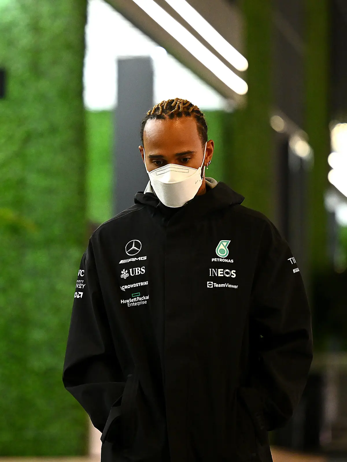 JEDDAH, SAUDI ARABIA - MARCH 25: Lewis Hamilton of Great Britain and Mercedes leaves the paddock after the drivers and team principals meeting after practice ahead of the F1 Grand Prix of Saudi Arabia at the Jeddah Corniche Circuit on March 25, 2022 in Jeddah, Saudi Arabia. (Photo by Clive Mason/Getty Images)