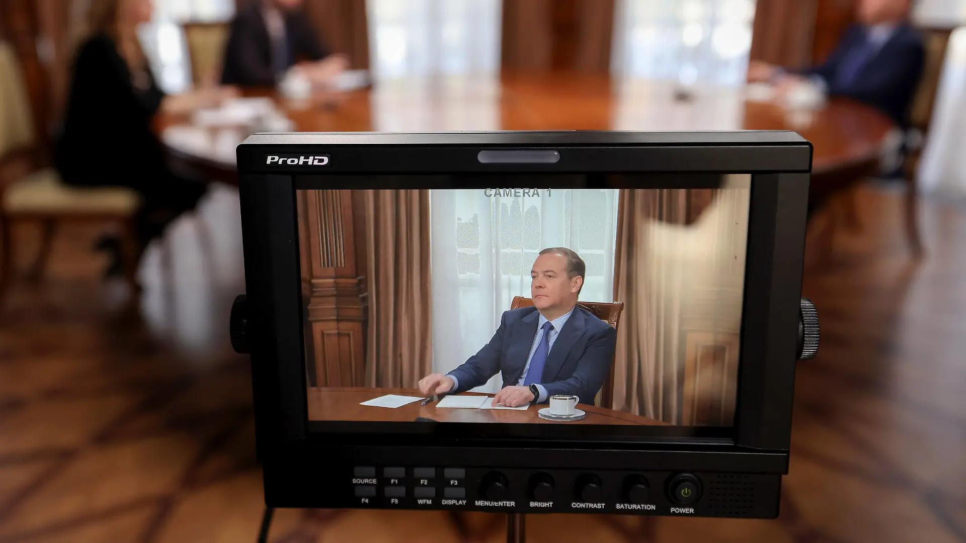 MOSCOW REGION, RUSSIA - MARCH 24, 2022: United Russia Party Chairman and Russian Security Council Deputy Chairman Dmitry Medvedev on the screen during an interview to the Rossiya Segodnya news agency and RT TV channel at the Gorki residence. Yekaterina Shtukina/POOL/TASS PUBLICATIONxINxGERxAUTxONLY TS129430 