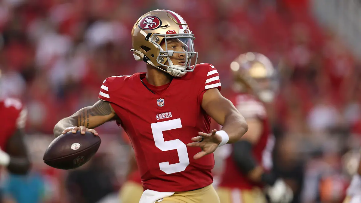 San Francisco 49ers quarterback Trey Lance (5) passes against the Denver Broncos during the second half of an NFL preseason football game in Santa Clara, Calif., Saturday, Aug. 19, 2023. (AP Photo/Jed Jacobsohn)