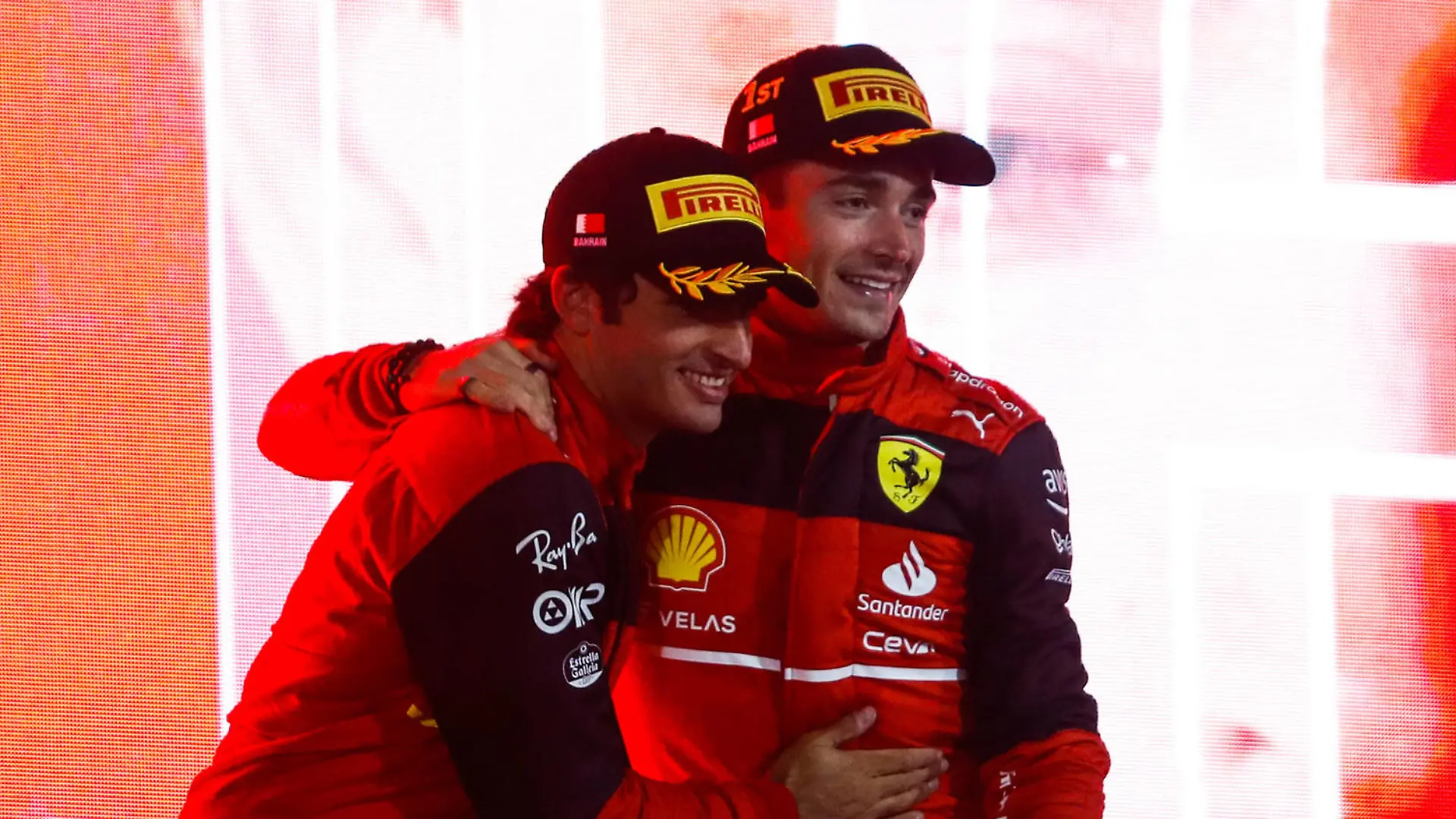 Formula 1 2022: Bahrain GP BAHRAIN INTERNATIONAL CIRCUIT, BAHRAIN - MARCH 20: Carlos Sainz, Ferrari, 2nd position, and Charles Leclerc, Ferrari, 1st position, celebrate on the podium during the Bahrain GP at Bahrain International Circuit on Sunday March 20, 2022 in Sakhir, Bahrain. Photo by Carl Bingham / LAT Images Images PUBLICATIONxINxGERxSUIxAUTxHUNxONLY GP2201_175139_31I2412