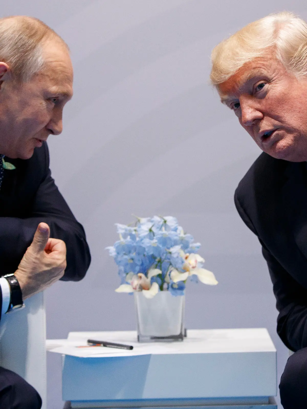 FILE - In this  July 7, 2017, file photo, U.S. President Donald Trump meets with Russian President Vladimir Putin at the G-20 Summit in Hamburg. Putin won’t congratulate President-elect Joe Biden until legal challenges to the U.S. election are resolved and the result is official, the Kremlin announced Monday, Nov. 9, 2020. When Donald Trump won in 2016, Putin was prompt in offering congratulations, but his spokesman Dmitry Peskov told reporters that this year’s election is different. (AP Photo/Evan Vucci, File)