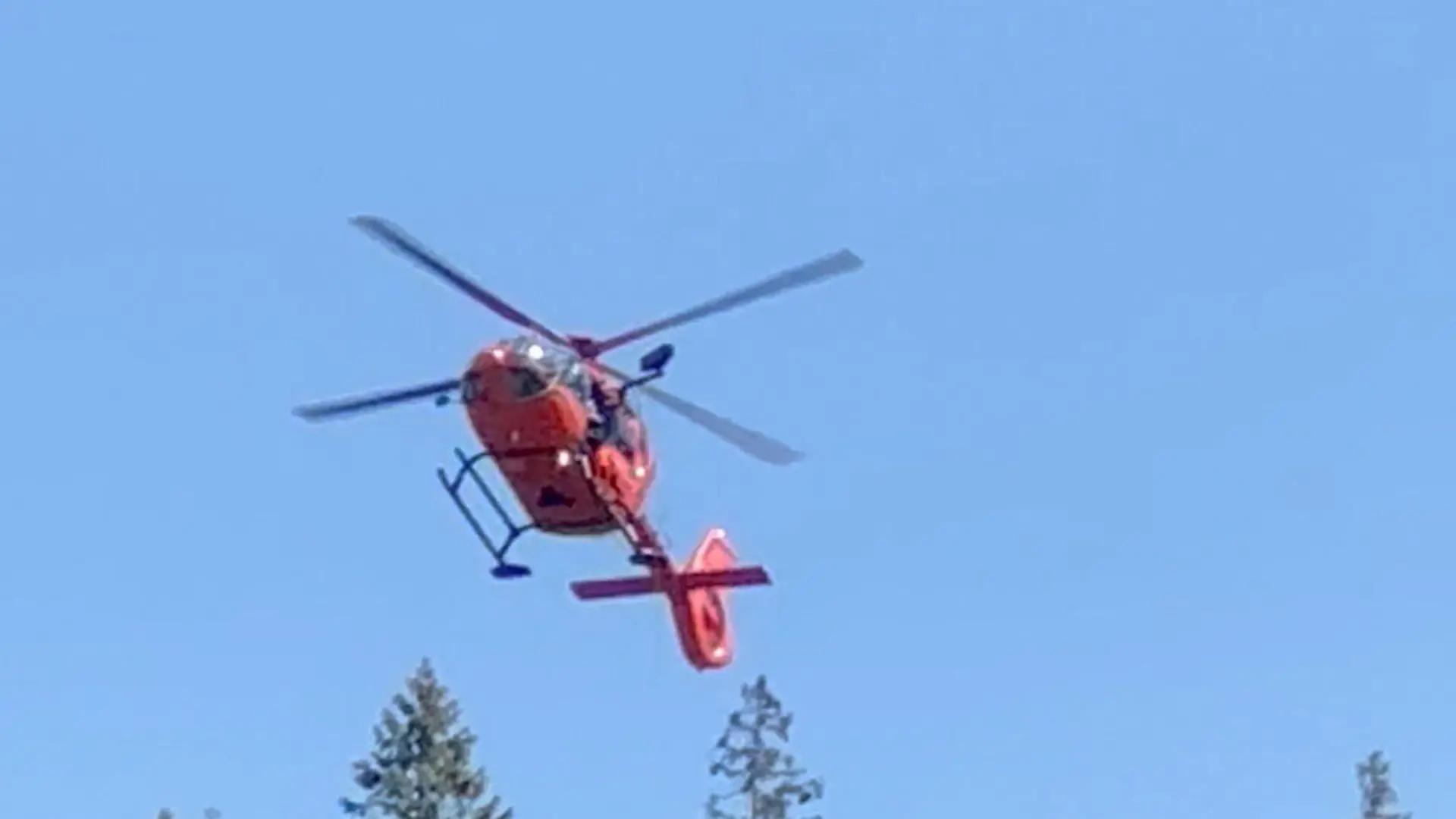 A rescue helicopter flies, following police reports of an attack, near Neuschwanstein Castle, Germany, June 14, 2023 in this screengrab obtained from a social media video. ERIC ABNERI/via REUTERS THIS IMAGE HAS BEEN SUPPLIED BY A THIRD PARTY. MANDATORY CREDIT. NO RESALES. NO ARCHIVES.