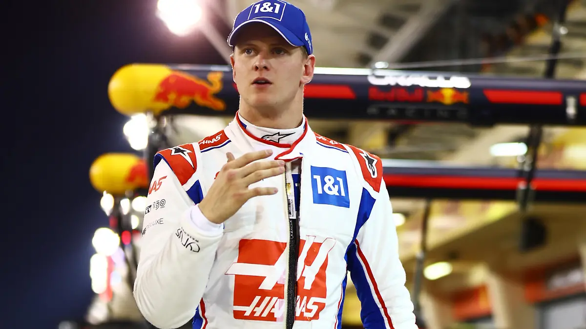 BAHRAIN, BAHRAIN - MARCH 19: Mick Schumacher of Germany and Haas F1 walks in the Pitlane after qualifying in 12th position during qualifying ahead of the F1 Grand Prix of Bahrain at Bahrain International Circuit on March 19, 2022 in Bahrain, Bahrain. (Photo by Mark Thompson/Getty Images)