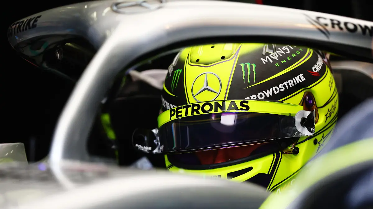 BAHRAIN, BAHRAIN - MARCH 18: Lewis Hamilton of Great Britain and Mercedes prepares to drive in the garage during practice ahead of the F1 Grand Prix of Bahrain at Bahrain International Circuit on March 18, 2022 in Bahrain, Bahrain. (Photo by Lars Baron/Getty Images)