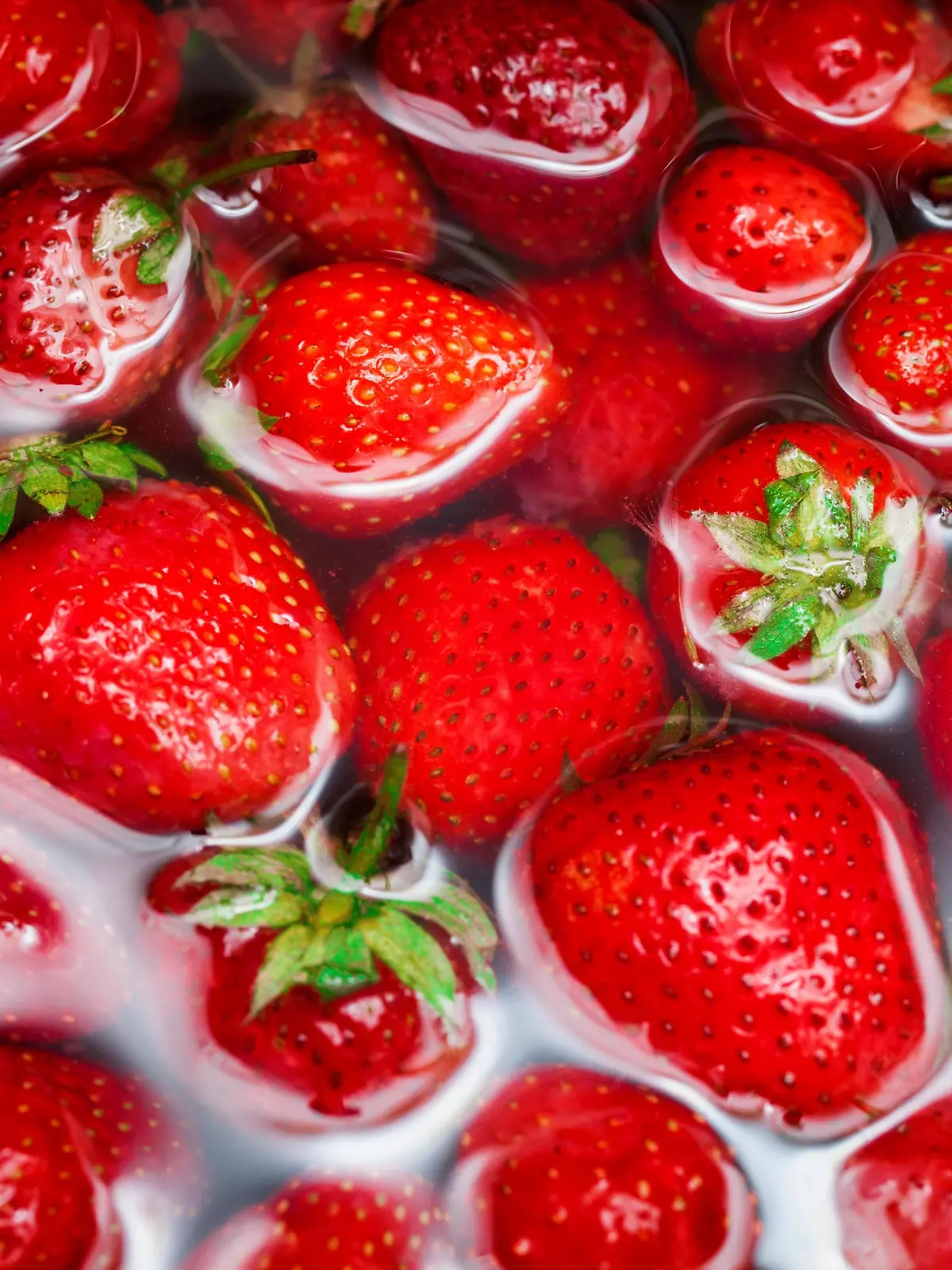Strawberries being washed with fresh water; Adobe RGB color space; see other similar images:
