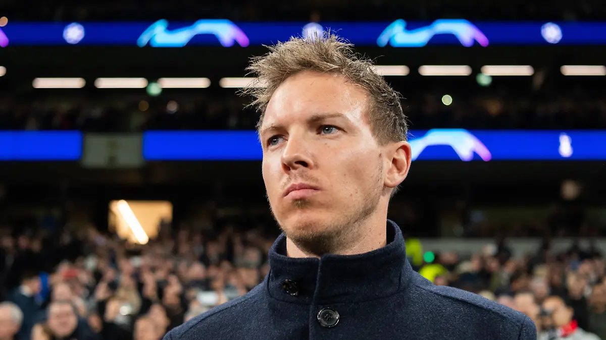 ARCHIV - 19.02.2020, Großbritannien, London: Fußball: Champions League, Tottenham Hotspur - RB Leipzig, K.o.-Runde, Achtelfinale, Hinspiele, im Tottenham Hotspur Stadium. Leipzigs Trainer Julian Nagelsmann steht vor Beginn des Spiels im Stadion. Leipzig soll einem Medienbericht zufolge neuer Trainer bei Paris Saint-Germain werden. (zu dpa: ««L·Équipe»: Nagelsmann soll neuer Trainer bei PSG werden») Foto: Robert Michael/dpa-Zentralbild/dpa +++ dpa-Bildfunk +++