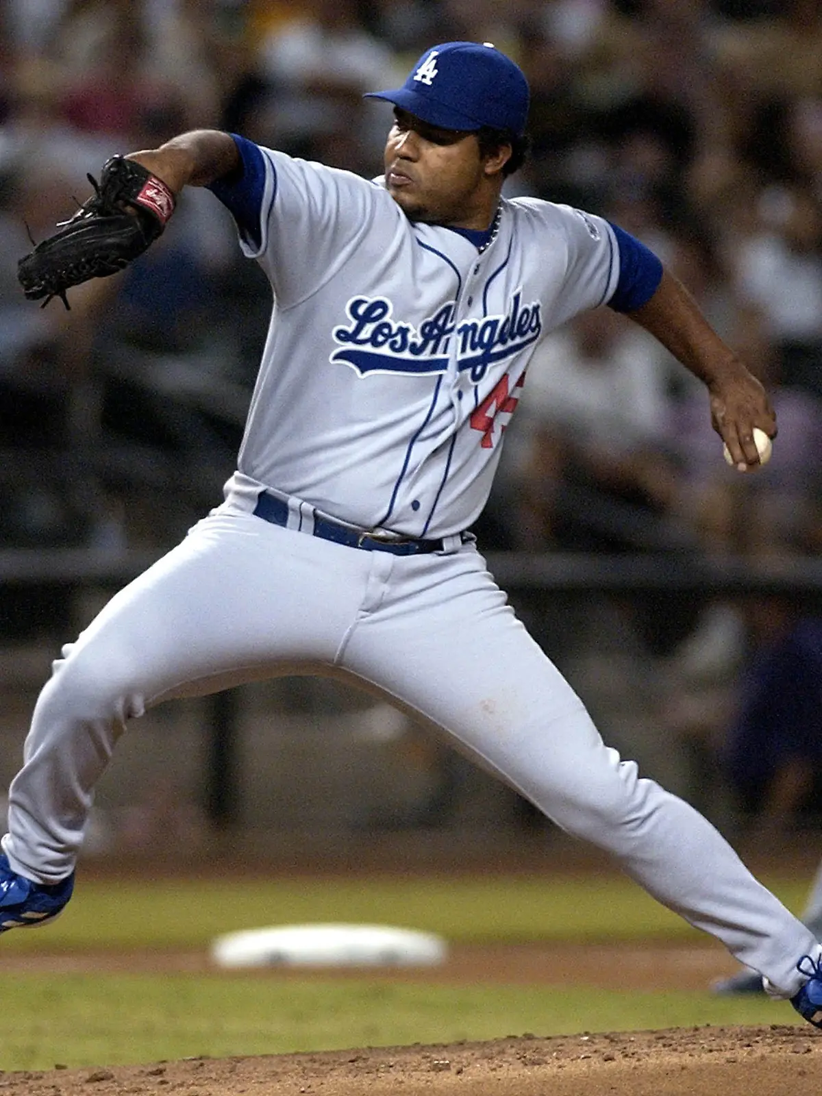 Los Angeles Dodgers starting pitcher Odalis Perez delivers in the second inning against the Arizona Diamondbacks on Saturday, July 17, 2004, in Phoenix. (AP Photo/Tom Hood)