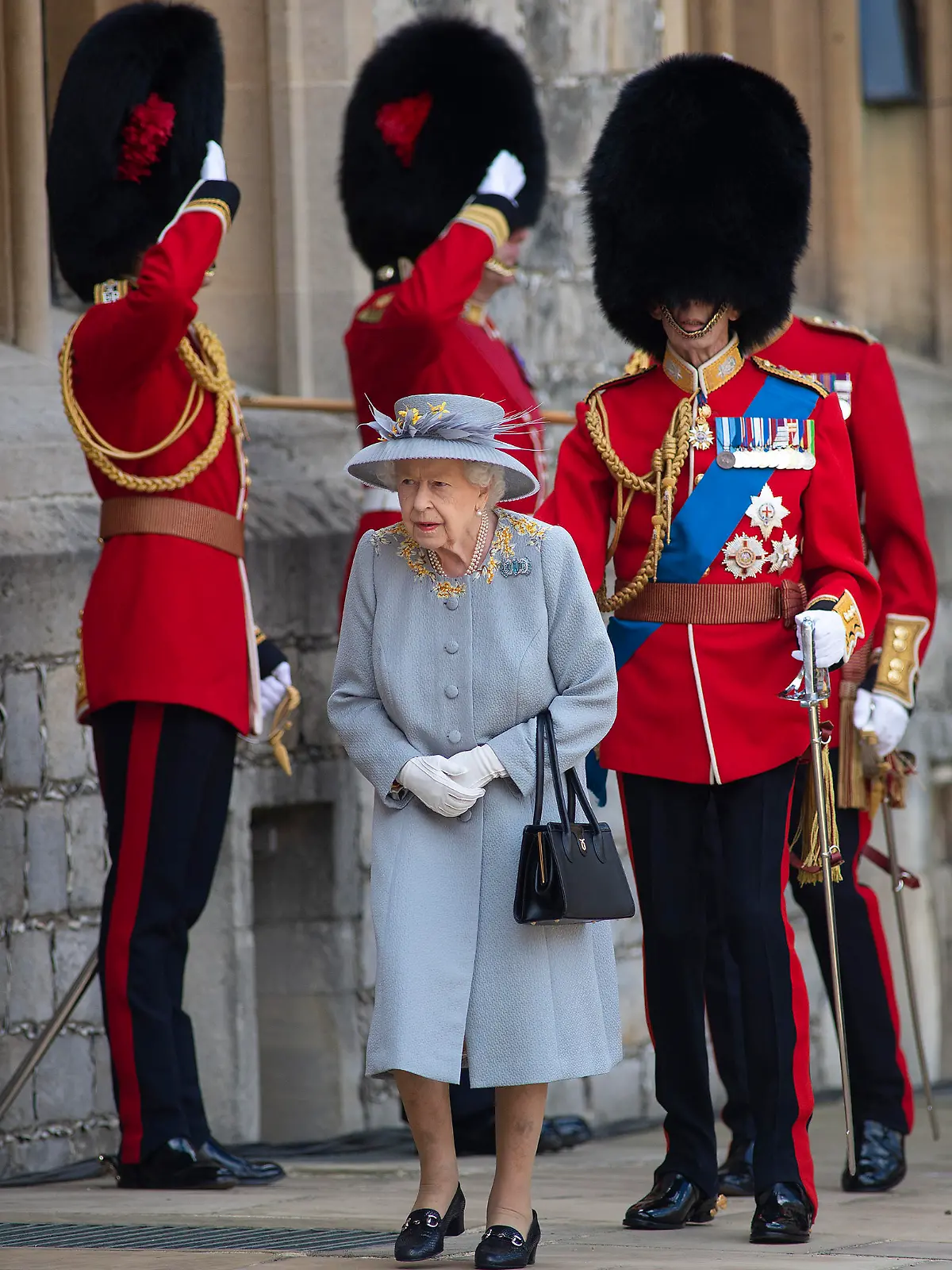 The Queen will view a military parade in the Quadrangle of Windsor Castle to mark Her Majesty's Official Birthday, on Saturday 12th June. The parade will be held by the Household Division, and The Queen's Colour of F Company Scots Guards will be trooped. His Royal Highness The Duke of Kent, Colonel, Scots Guards, will accompany The Queen., Credit:Â©Eddie Mulholland / Avalon