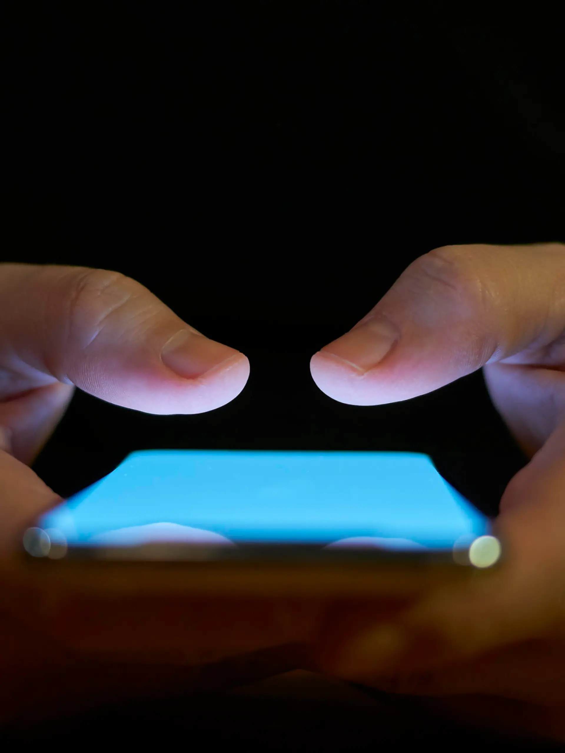 Young Men Using Smart Phone Social Media Concept