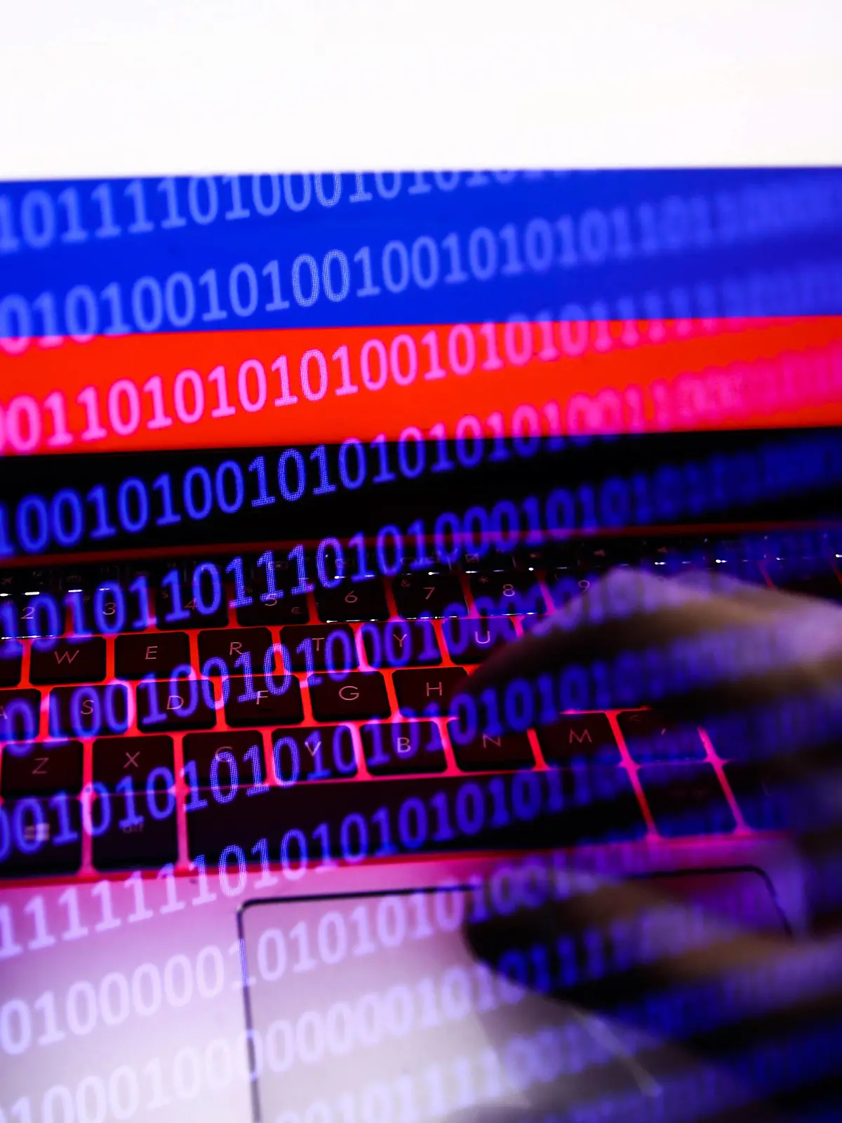 Russia, Ukraine And Internet Hacking Photo Illustrtions Russian flag displayed on a laptop screen and binary code code displayed on a screen are seen in this multiple exposure illustration photo taken in Krakow, Poland on February 16, 2022. Photo illustration by Jakub Porzycki/NurPhoto Krakow Poland PUBLICATIONxNOTxINxFRA Copyright: xJakubxPorzyckix originalFilename: porzycki-russiauk220216_np4U2.jpg 