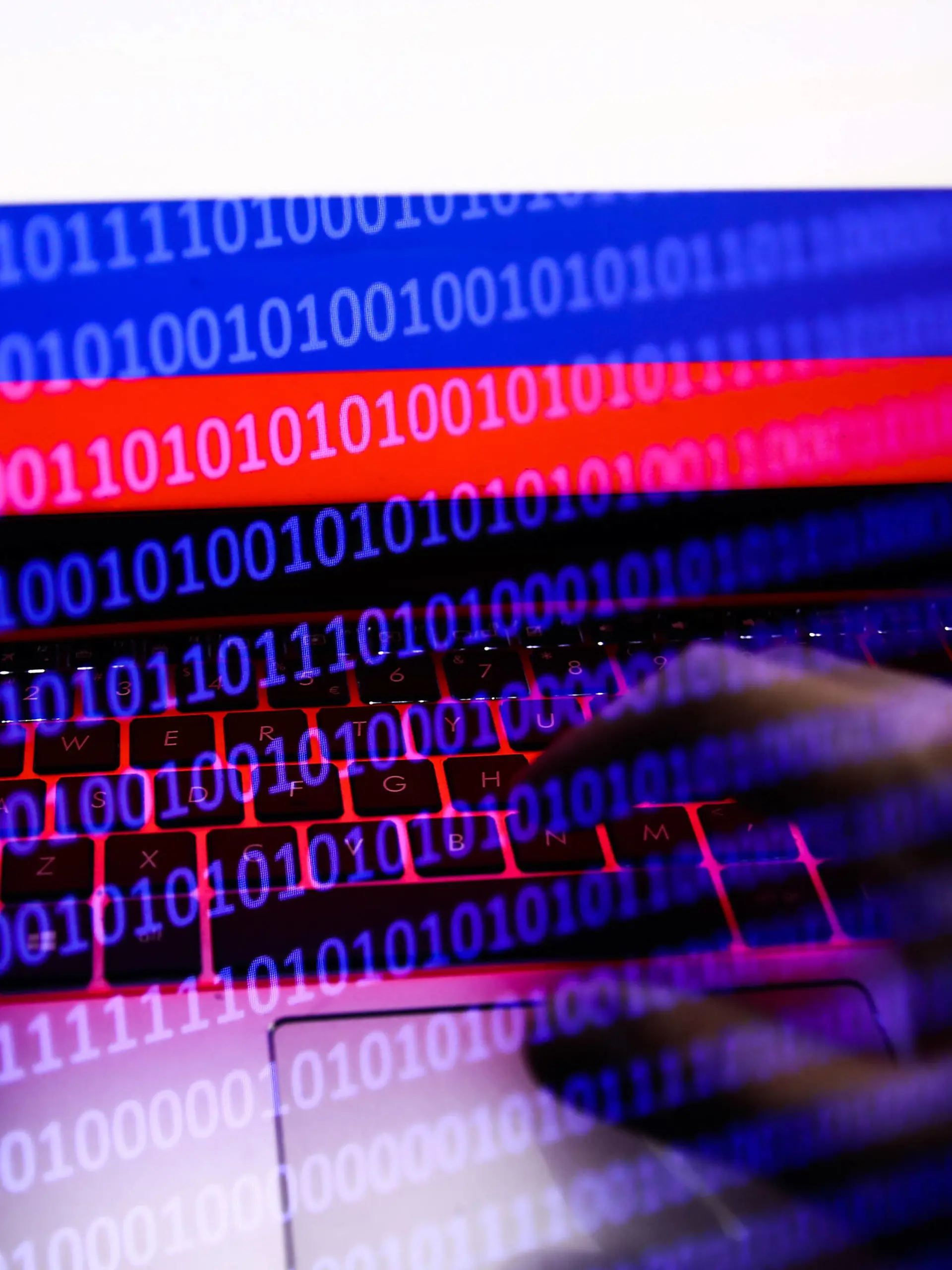 Russia, Ukraine And Internet Hacking Photo Illustrtions Russian flag displayed on a laptop screen and binary code code displayed on a screen are seen in this multiple exposure illustration photo taken in Krakow, Poland on February 16, 2022. Photo illustration by Jakub Porzycki/NurPhoto Krakow Poland PUBLICATIONxNOTxINxFRA Copyright: xJakubxPorzyckix originalFilename: porzycki-russiauk220216_np4U2.jpg 