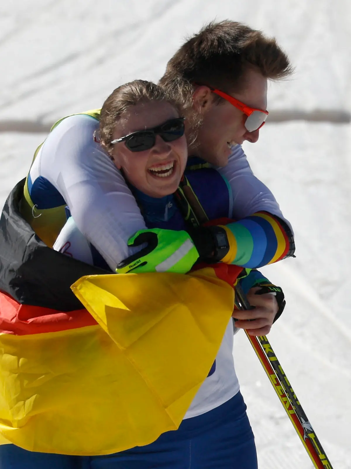 Beijing 2022 Winter Paralympic Games - Para Biathlon - Women's Middle Distance Vision Impaired - National Biathlon Centre, Zhangjiakou, China - March 8, 2022. Leonie Maria Walter of Germany celebrates with guide Pirmin Strecker of Germany after competing. REUTERS/Issei Kato