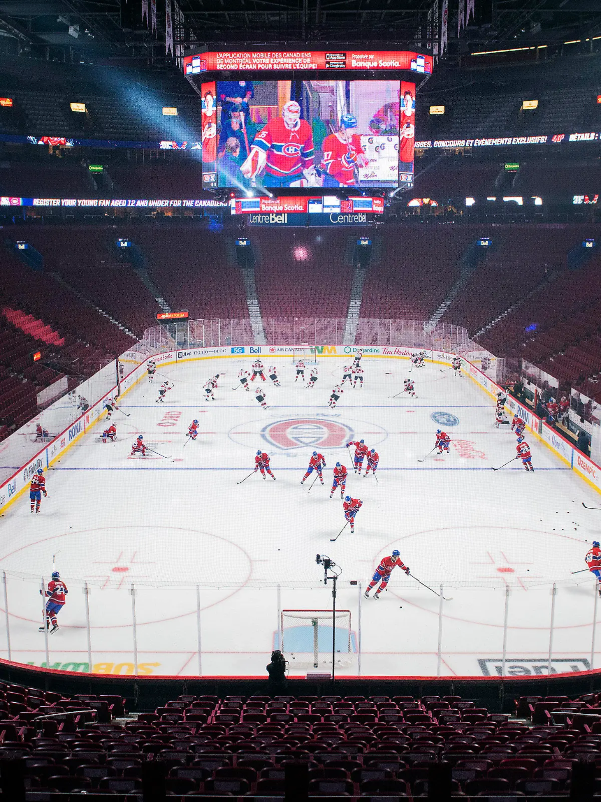 New Jersey Devils and Montreal Canadiens warm up before an NHL hockey game in Montreal, Tuesday, Feb., 8, 2022. (Graham Hughes/The Canadian Press via AP)