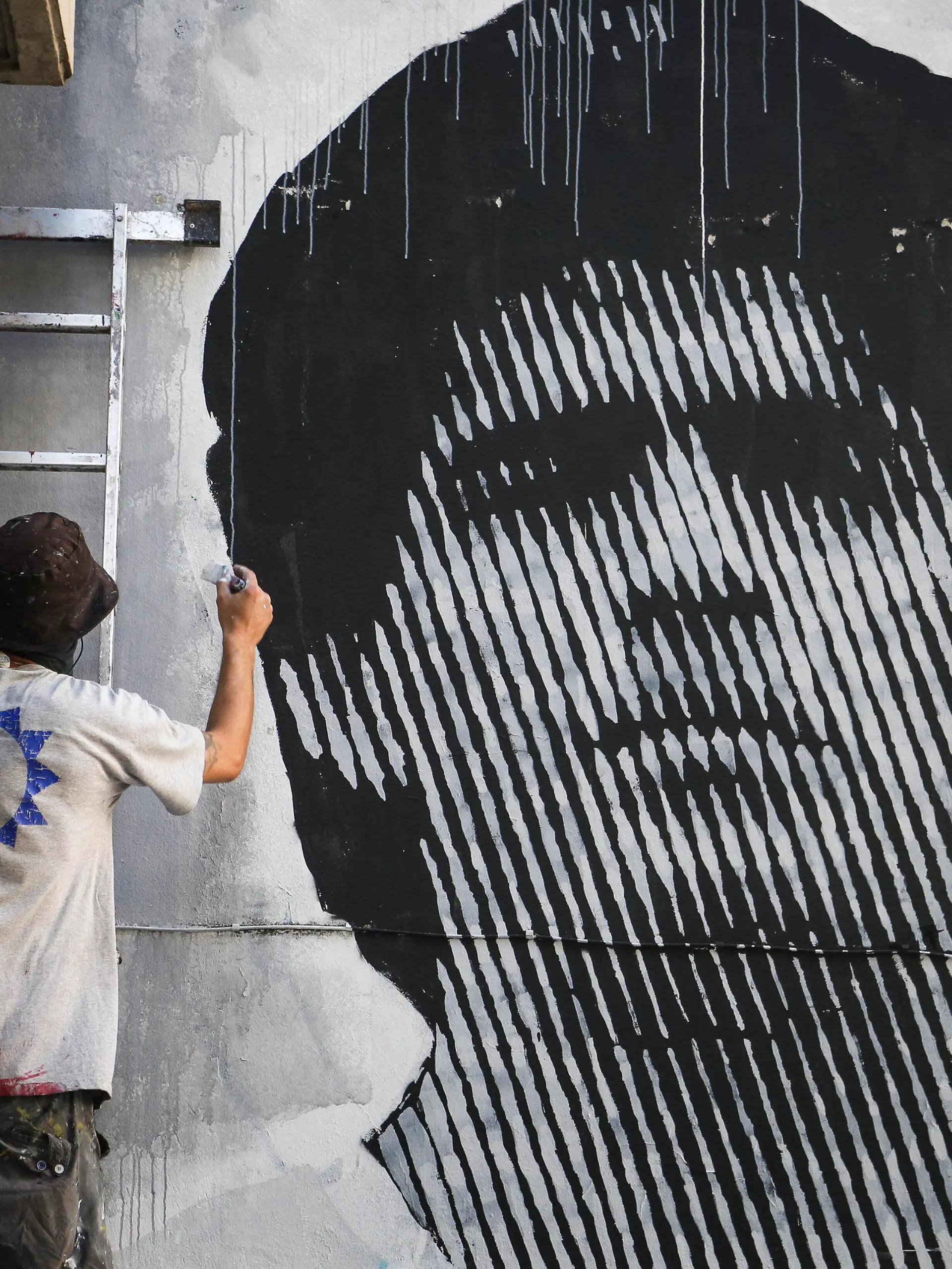 January 29, 2021, Rosario, Santa Fe, Argentina: Rosario, Santa Fe. The local artist Lacast works on a large mural by Diego Maradona in one of the streets of the city of Rosario, Argentina. More than two months after his death, the tributes to Diego Maradona continue. Rosario Argentina - ZUMAm246 20210129_znp_m246_003 Copyright: xAlanxMonzonx 