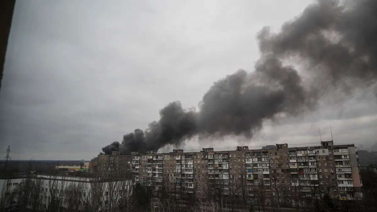 Smoke rises after shelling by Russian forces in Mariupol, Ukraine, Friday, March 4, 2022.(AP Photo/Evgeniy Maloletka)