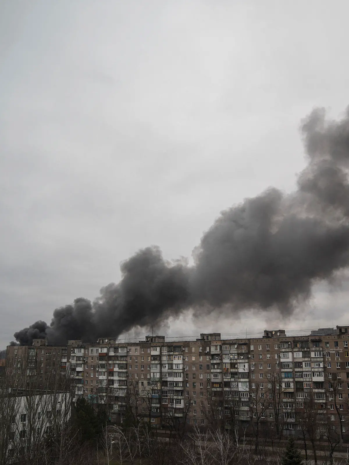 Smoke rises after shelling by Russian forces in Mariupol, Ukraine, Friday, March 4, 2022.(AP Photo/Evgeniy Maloletka)