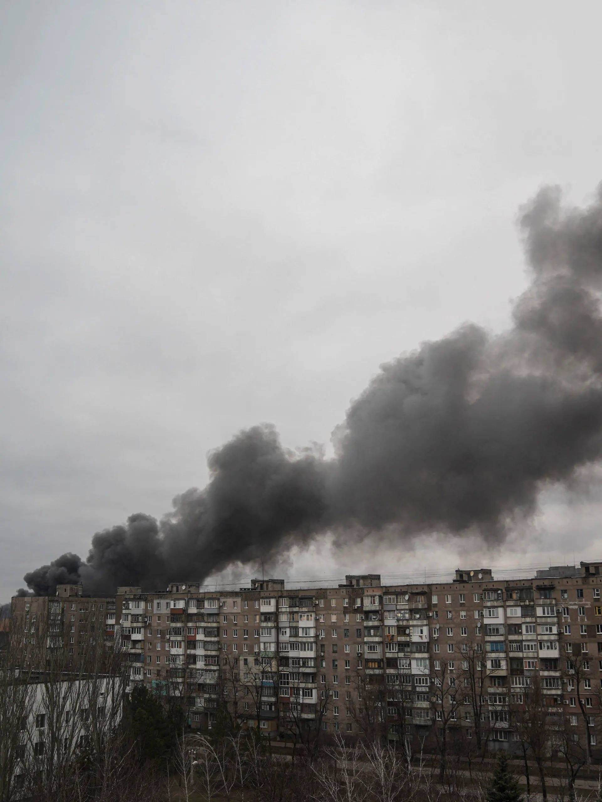 Smoke rises after shelling by Russian forces in Mariupol, Ukraine, Friday, March 4, 2022.(AP Photo/Evgeniy Maloletka)