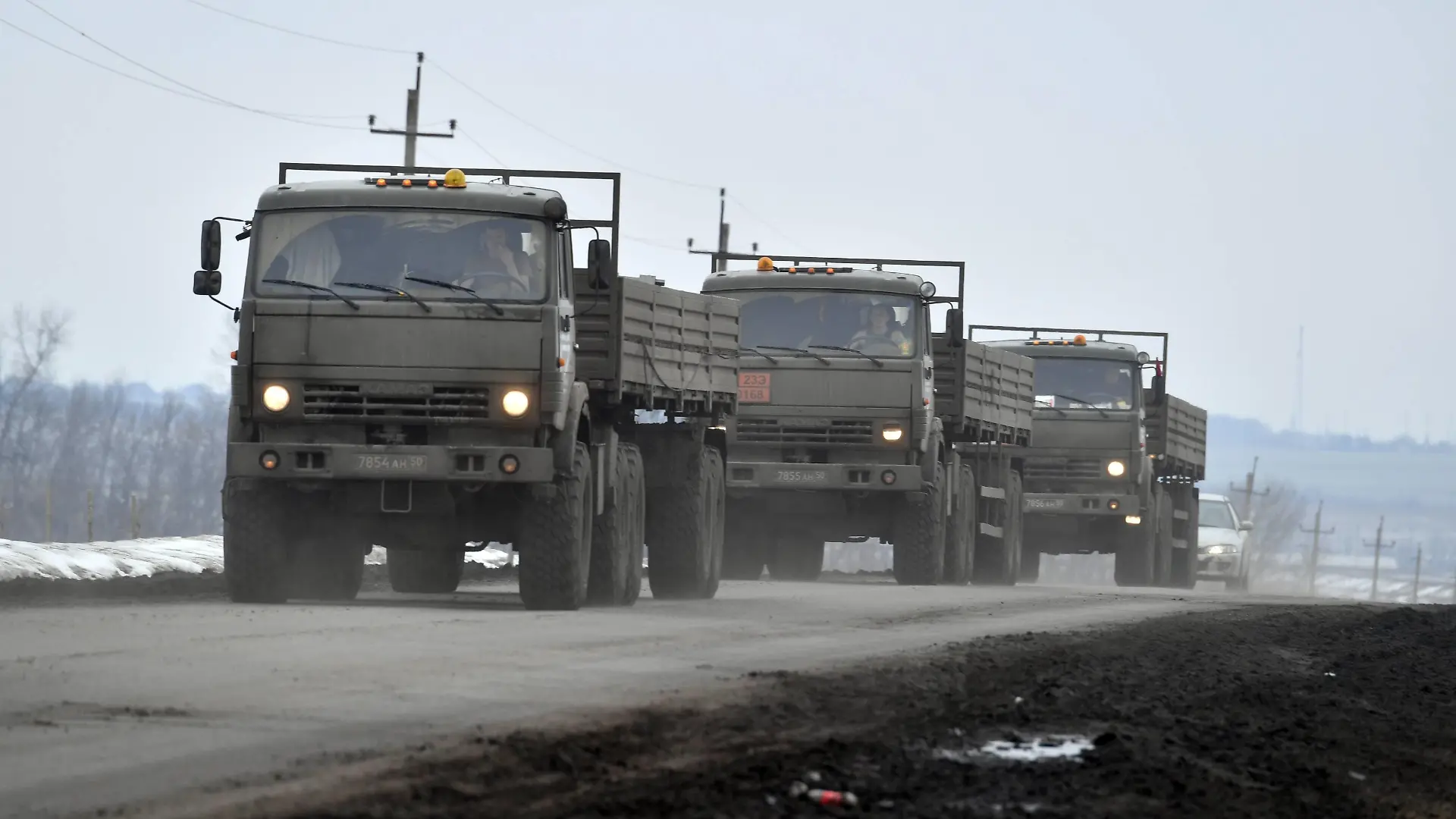 Russia Ukraine Military Operation 8128657 28.02.2022 Military trucks drive along a road near the border between Russia and Ukraine in Belgorod region, Russia. On February 24 Russian President Vladimir Putin announced a military operation in Ukraine following recognition of independence of breakaway Donetsk and Luhansk republics. Mikhail Voskresenskiy / Sputnik Belgorod region Russia PUBLICATIONxINxGERxSUIxAUTxONLY Copyright: xMikhailxVoskresenskiyx