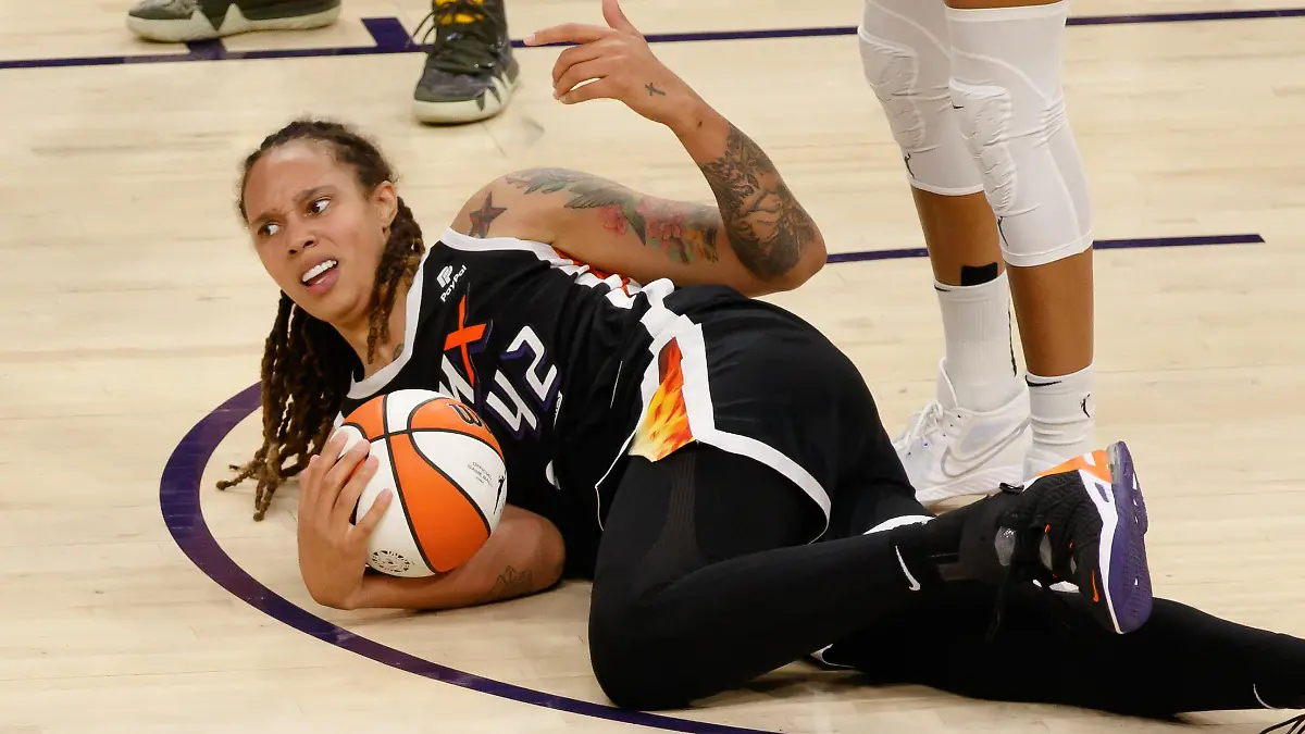 October 13, 2021, Phoenix, Arizona, United States: Phoenix, Arizona, October 13th 2 Brittney Griner (42 Phoenix Mercury) lies on the floor after being fouled during Game 2 of the Women's National Basketball Association Finals between Phoenix Mercury and Chicago Sky at Footprint Center Arena in Phoenix, Arizona. NO COMMERCIAL USAGE. (Credit Image: Â© Andrea Vilchez/Sport Press Photo via ZUMA Press
