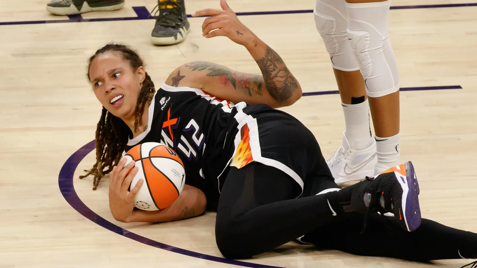 October 13, 2021, Phoenix, Arizona, United States: Phoenix, Arizona, October 13th 2 Brittney Griner (42 Phoenix Mercury) lies on the floor after being fouled during Game 2 of the Women's National Basketball Association Finals between Phoenix Mercury and Chicago Sky at Footprint Center Arena in Phoenix, Arizona. NO COMMERCIAL USAGE. (Credit Image: Â© Andrea Vilchez/Sport Press Photo via ZUMA Press