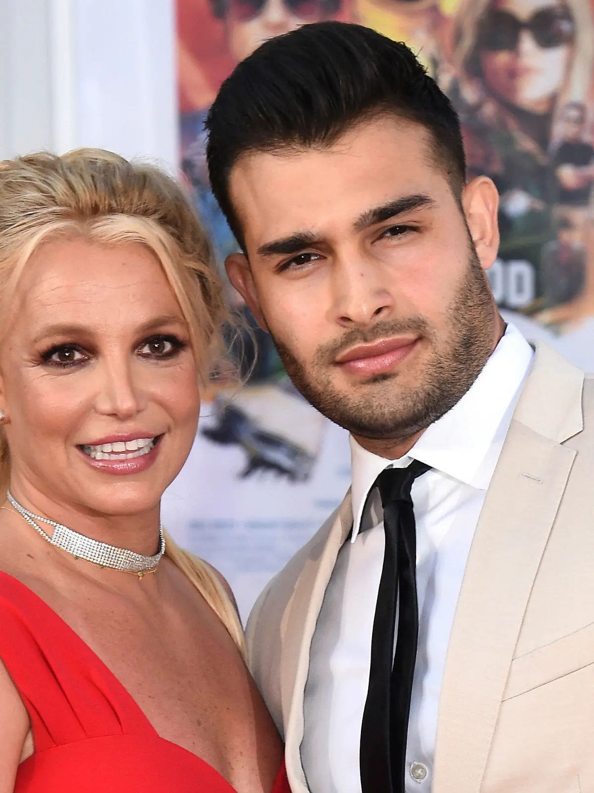 ARCHIV - 22.07.2019, USA, Los Angeles: Britney Spears und Sam Asghari bei der Premiere von "Once Upon a Time in Hollywood".     (zu dpa "Ehemann von Britney Spears gibt Scheidung bekannt") Foto: Jordan Strauss/Invision via AP/dpa +++ dpa-Bildfunk +++