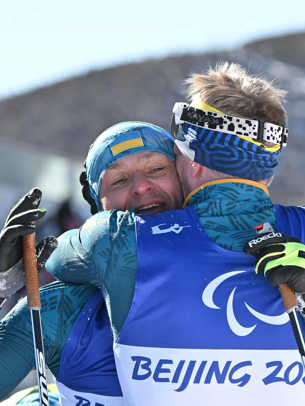 Ukraine's LUKIANENKO Vitalii celebrates after winning the Men's Sprint Vision Impaired - Para Biathlon at Zhangjiakou National Biathlon Centre in Zhangjiakou, Hebei, China on March 5, 2022. ( The Yomiuri Shimbun via AP Images )