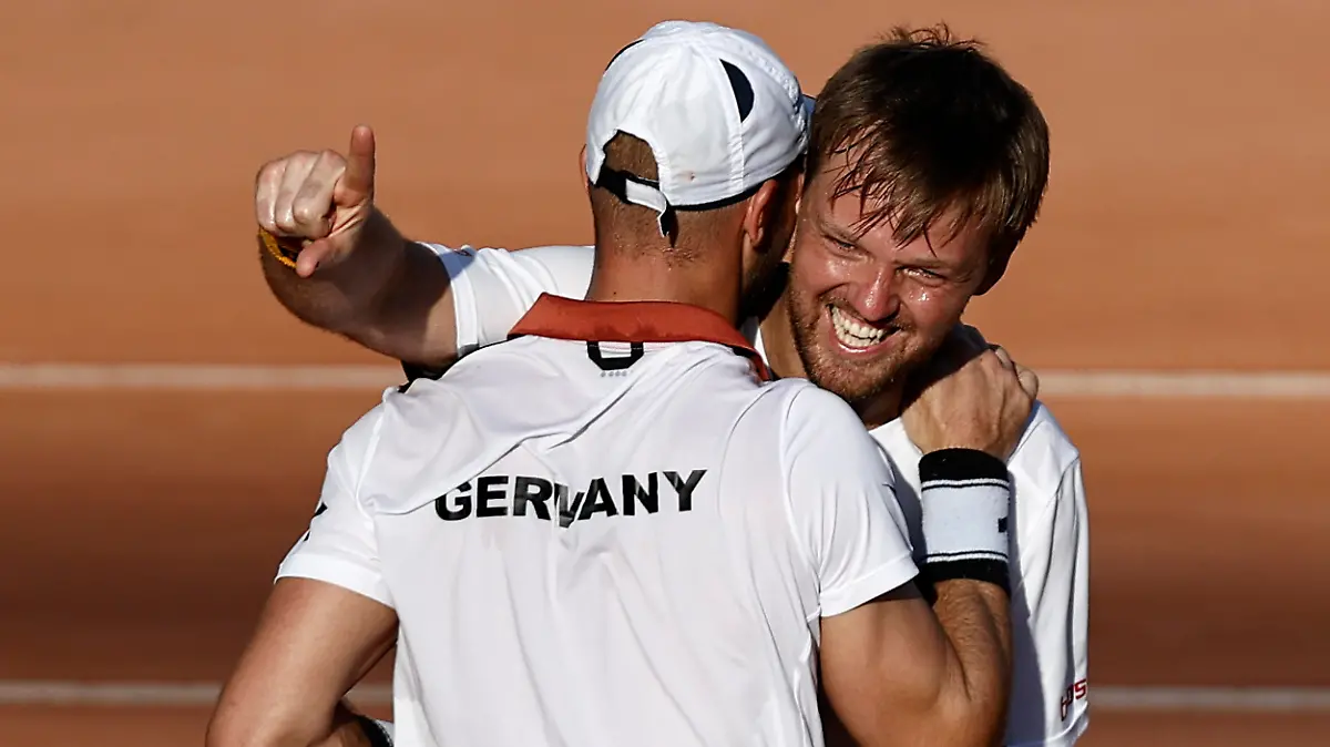 RIO DE JANEIRO, BRAZIL - MARCH 05: Tim Puetz (L) and Kevin Krawietz of Germany celebrate the victory against Felipe Meliugeni and Bruno Soares of Brazil during their match on Day Two of the 2022 Davis Cup Qualifier at Parque Olímpico Arena Tenis on March 05, 2022 in Rio de Janeiro, Brazil. (Photo by Buda Mendes/Getty Images)