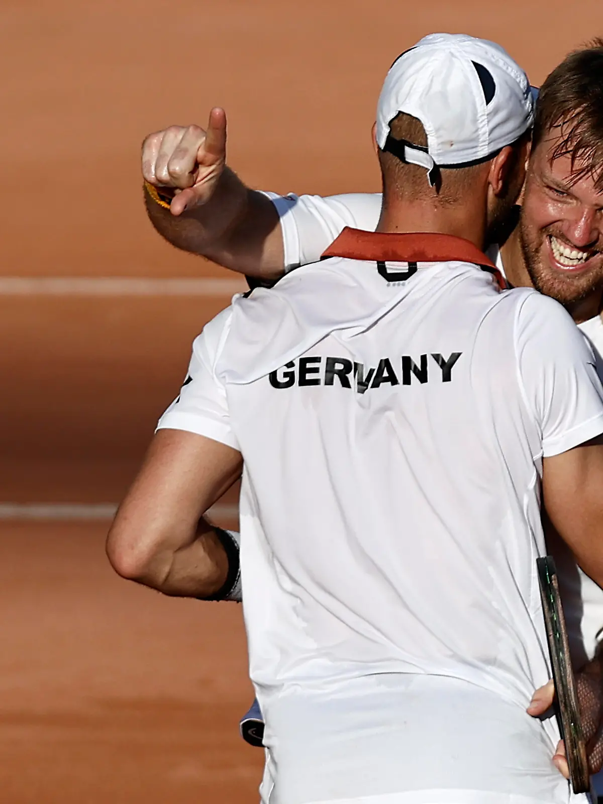 RIO DE JANEIRO, BRAZIL - MARCH 05: Tim Puetz (L) and Kevin Krawietz of Germany celebrate the victory against Felipe Meliugeni and Bruno Soares of Brazil during their match on Day Two of the 2022 Davis Cup Qualifier at Parque Olímpico Arena Tenis on March 05, 2022 in Rio de Janeiro, Brazil. (Photo by Buda Mendes/Getty Images)