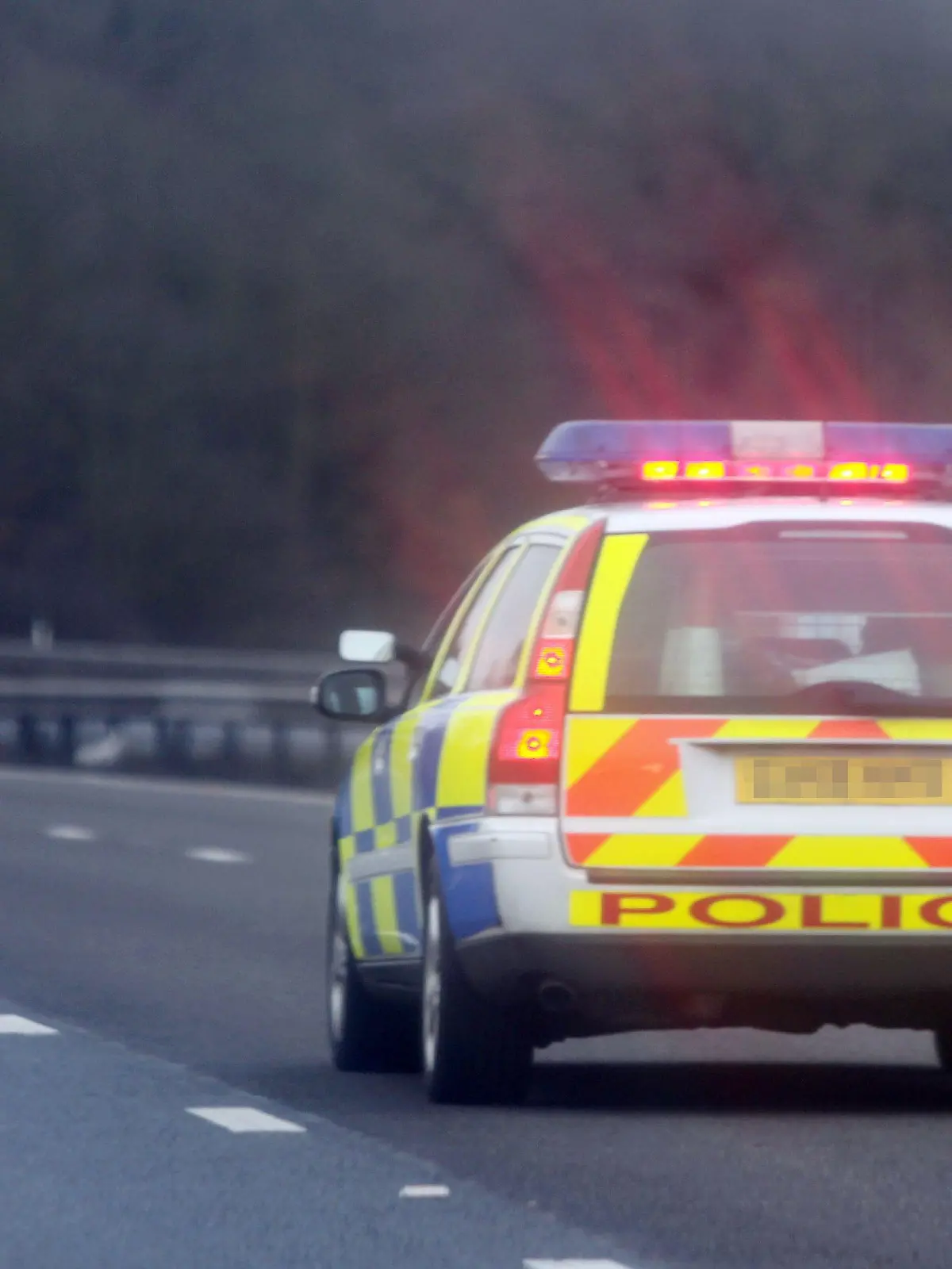 Police positioned outside Katie Price's house are said to have called other officers to perform a rolling block for the star as she drove on the A3 road, causing other drivers to slow to 20 mph so photographers could not get close Surrey, England - 01.02.11Mandatory Credit: WENN.com