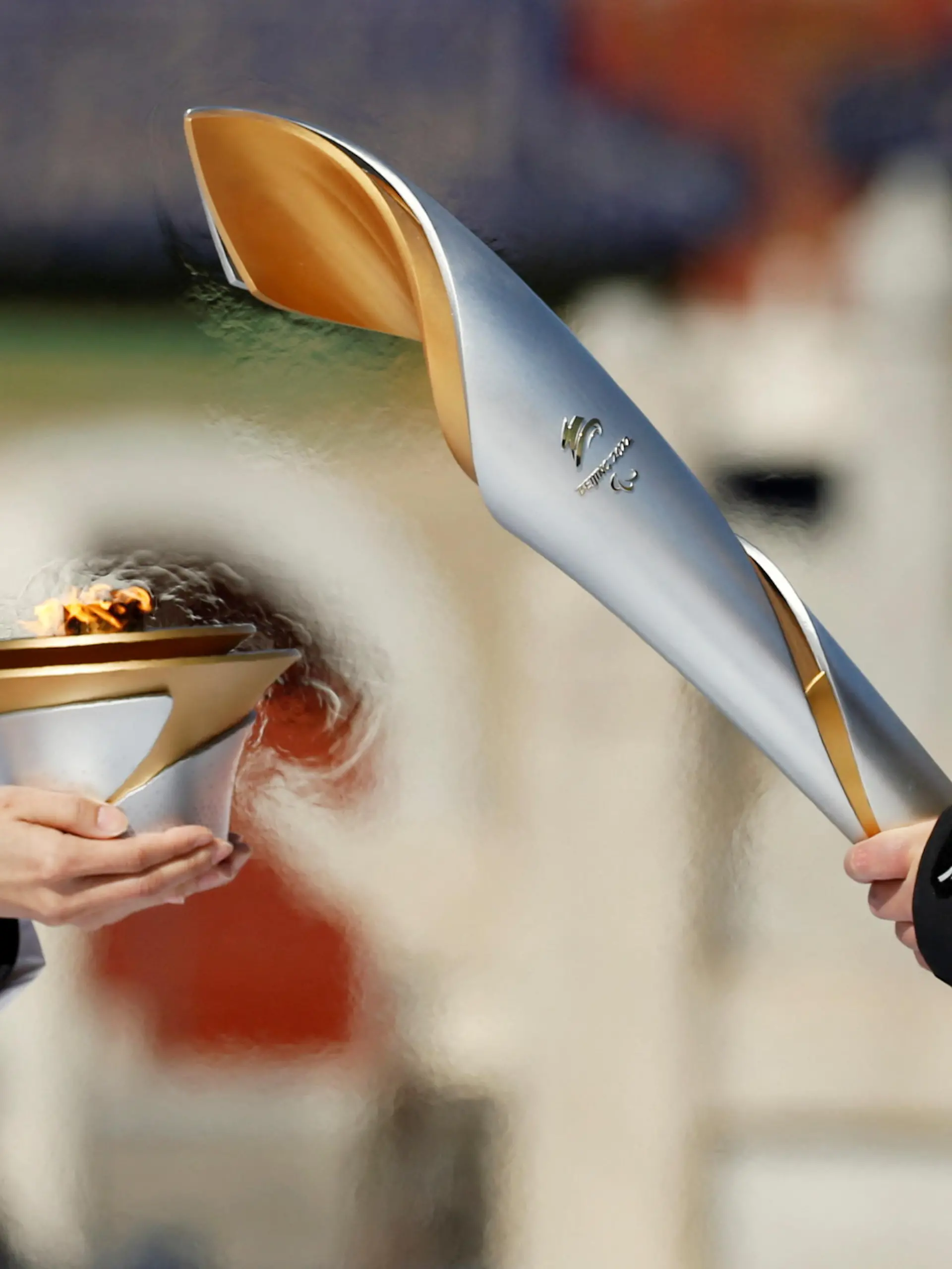 Olympics - Beijing 2022 Winter Paralympics - Torch Relay - Beijing, China - March 2, 2022. Participants take part in the flame lighting ceremony at the Temple of Heaven. REUTERS/Florence Lo
