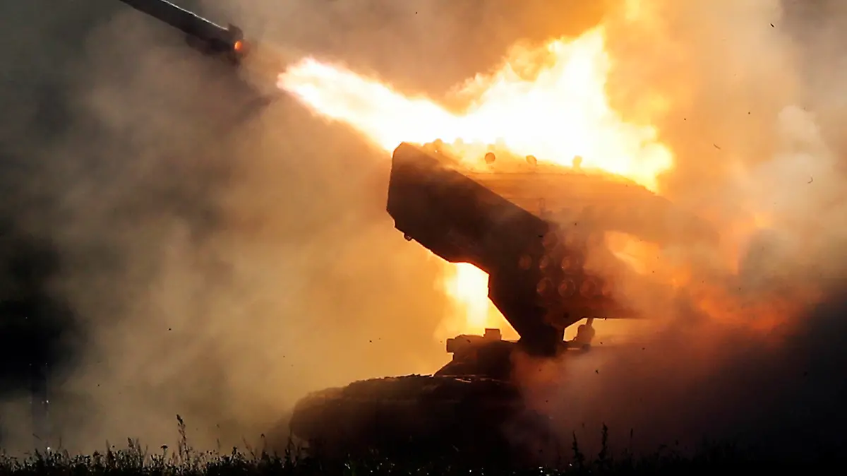 Russian heavy flamethrower system TOS-1 fires during the International Military Technical Forum Army-2018 in Alabino, outside Moscow, Tuesday, Aug. 21, 2018. Russia has displayed its latest weapons at a military show aimed at attracting more foreign customers. (AP Photo/Pavel Golovkin)