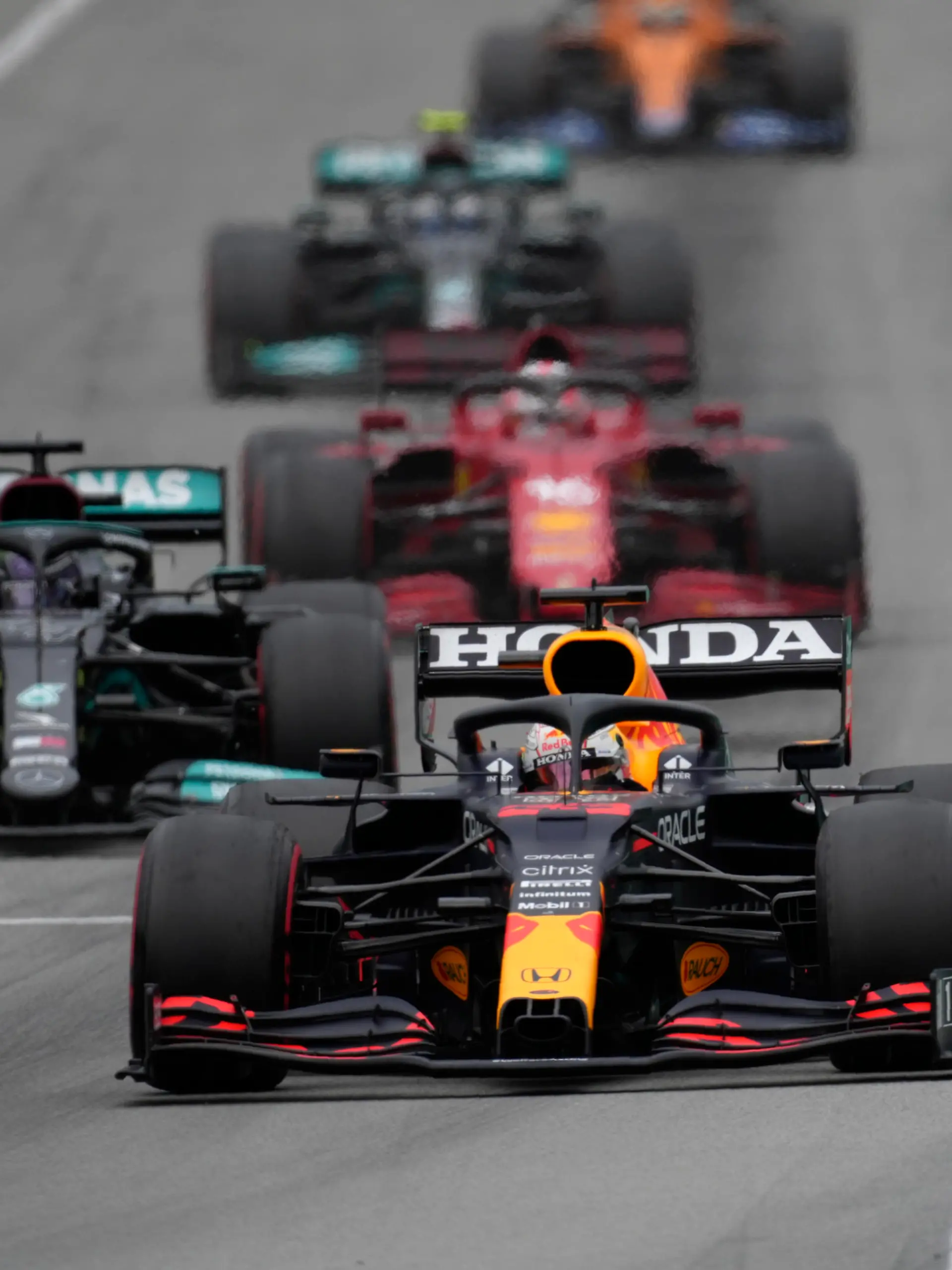 Red Bull driver Max Verstappen of the Netherlands leads Mercedes driver Lewis Hamilton of Britain during the Spanish Formula One Grand Prix at the Barcelona Catalunya racetrack in Montmelo, just outside Barcelona, Spain, Sunday, May 9, 2021. (AP Photo/Emilio Morenatti)