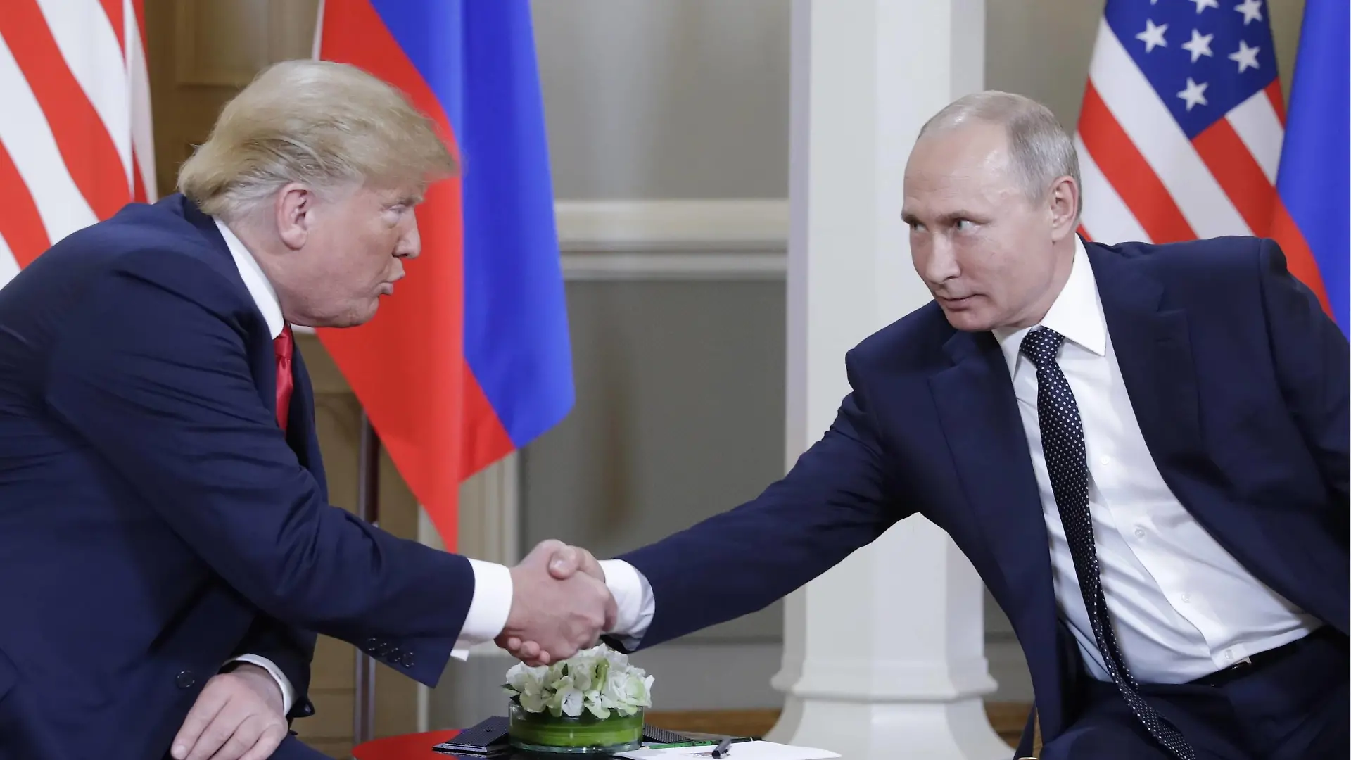 HELSINKI, FINLAND - JULY 16, 2018: US President Donald Trump (L) and Russia s President Vladimir Putin shake hands during a meeting at the Presidential Palace. Mikhail Metzel/TASS PUBLICATIONxINxGERxAUTxONLY TS089C88  